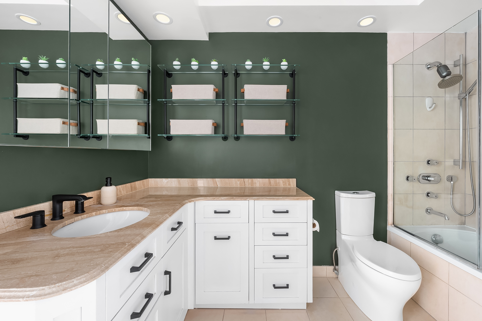 225 West 83rd Street, Unit 8L Manhattan, NY 10024 - Photo 8 of 18 a bathroom with a sink a toilet and shower
