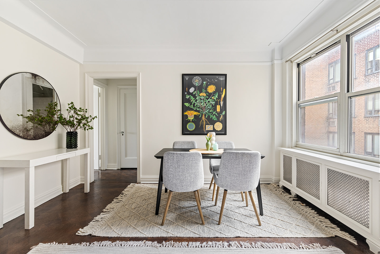 70 Remsen Street, Unit 8F Brooklyn, NY 11201 - Photo 4 of 8 a dining room with furniture a rug and wooden floor