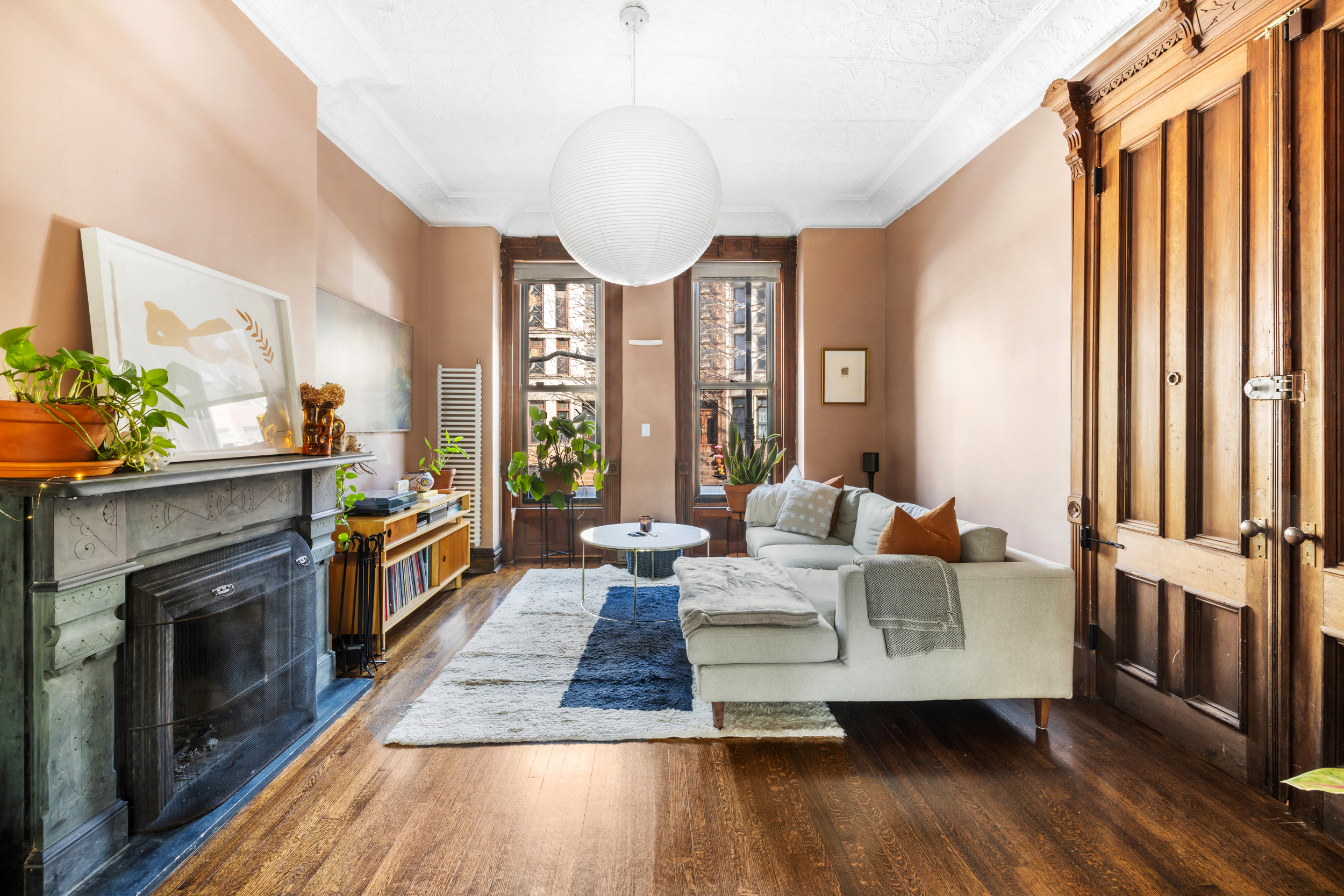252 Stuyvesant Brooklyn, NY 11221 - Photo 6 of 18 a living room with furniture fireplace and flat screen tv
