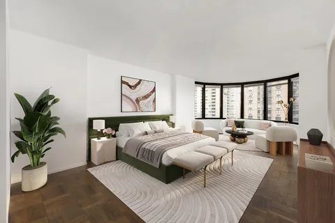 a bedroom with bed and a large window