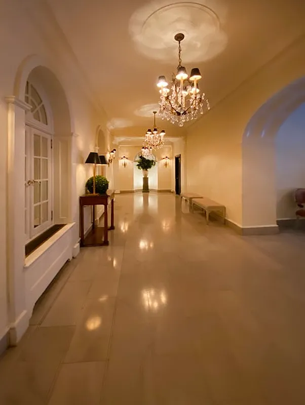1060 Park Avenue, Unit 3A Manhattan, NY 10128 - Photo 8 of 11 a view of a room with chandelier fan and wooden floor