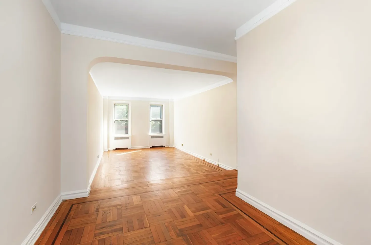 a view of an empty room and window