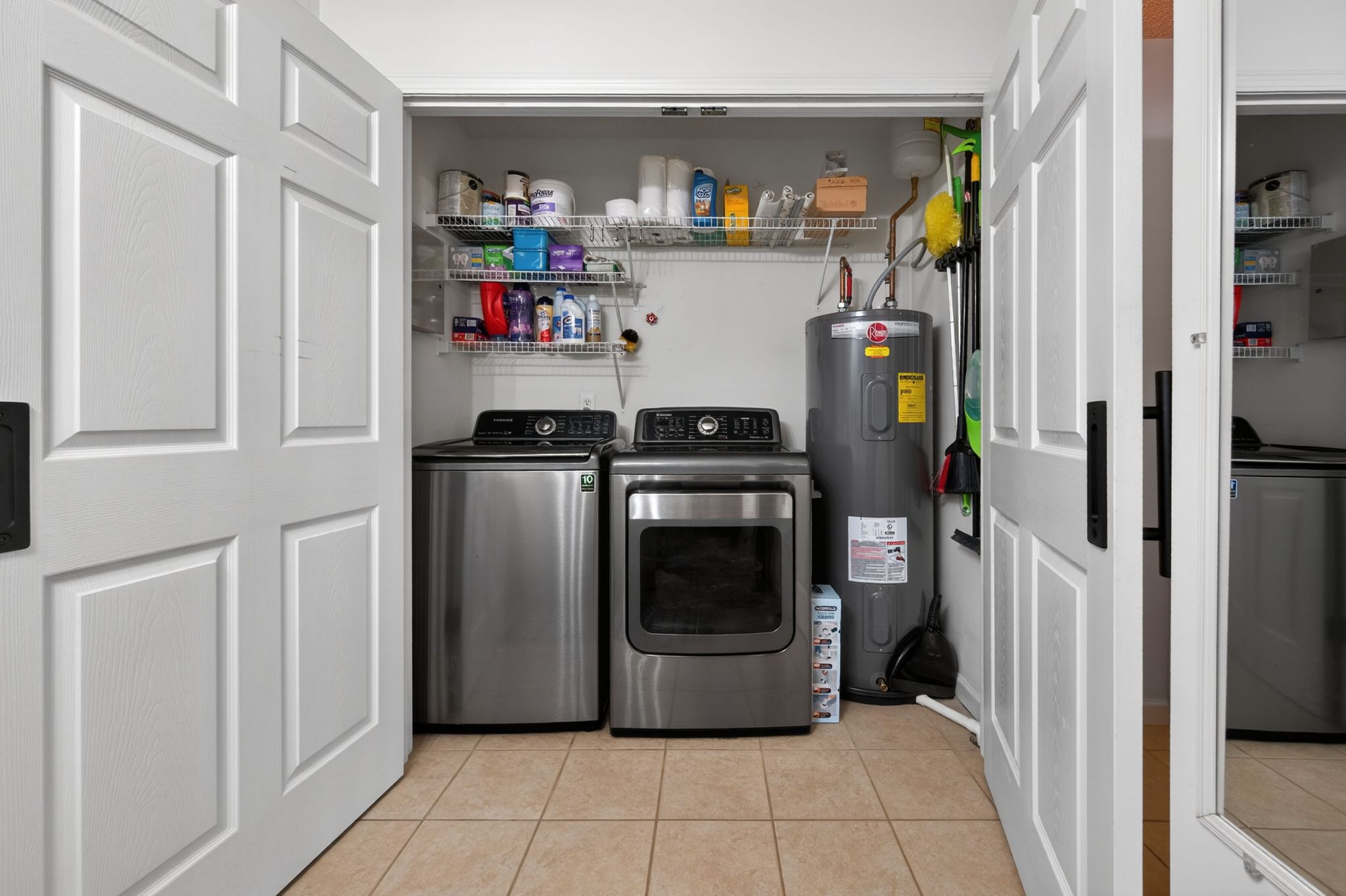 Huntscroft Lane Raleigh, NC 27617 - Photo 40 of 49 a utility room with fridge and washer