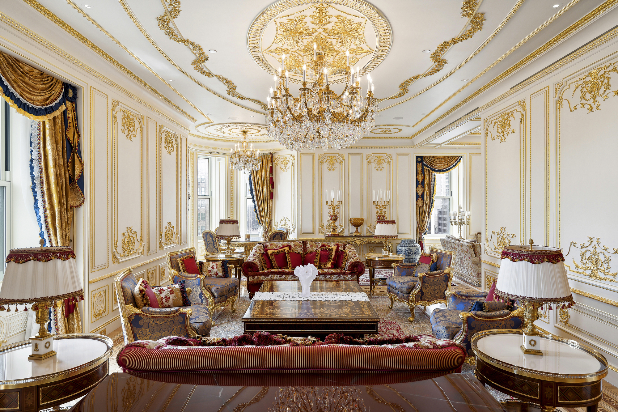 1 Central Park South, Unit 10071009 Manhattan, NY 10019 - Photo 17 of 28 a living room with fireplace furniture and a large window