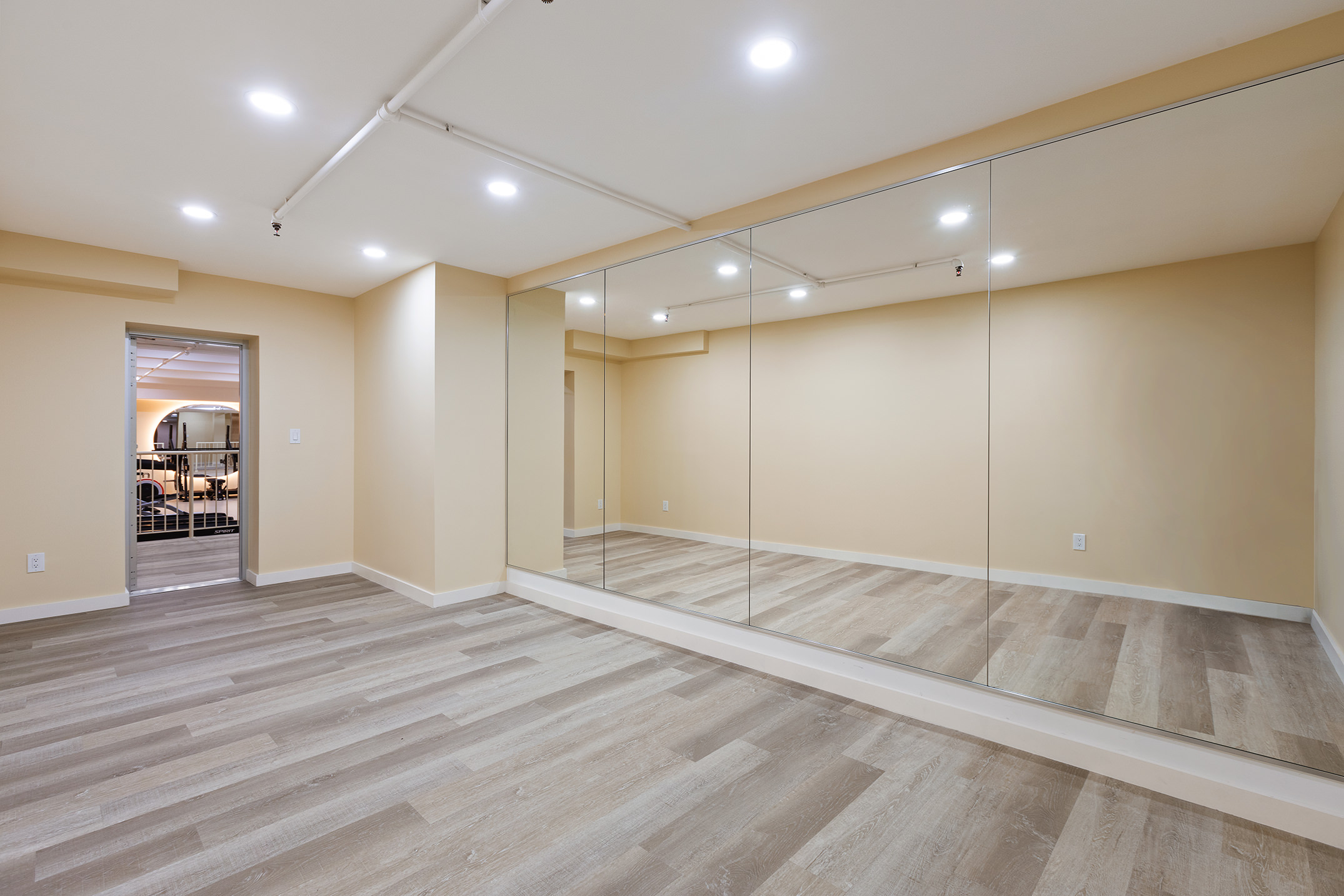 194 East 2nd Street, Unit 4A Manhattan, NY 10009 - Photo 12 of 13 a view of an empty room with wooden floor