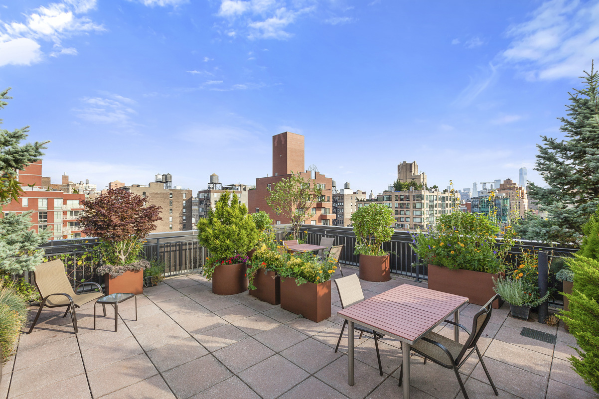 201 West 21st Street, Unit 9A Manhattan, NY 10011 - Photo 11 of 13 a view of a terrace with furniture and a potted plants
