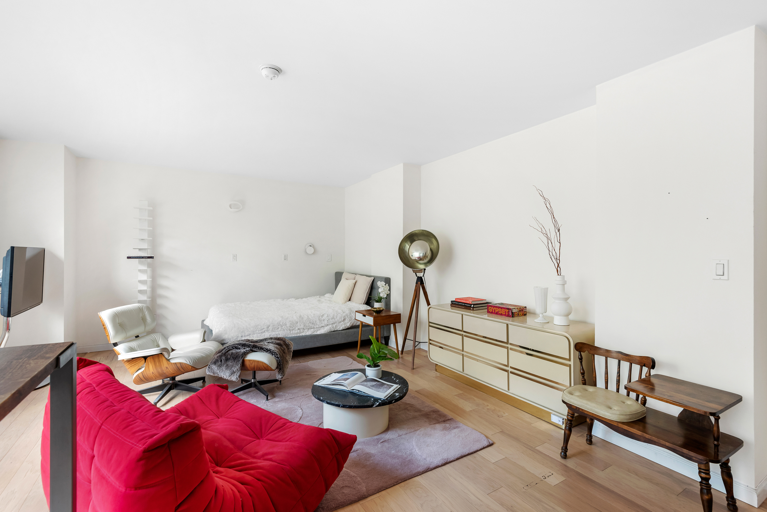 250 South End Avenue, Unit 3F Manhattan, NY 10280 - Photo 2 of 11 a living room with furniture and rug
