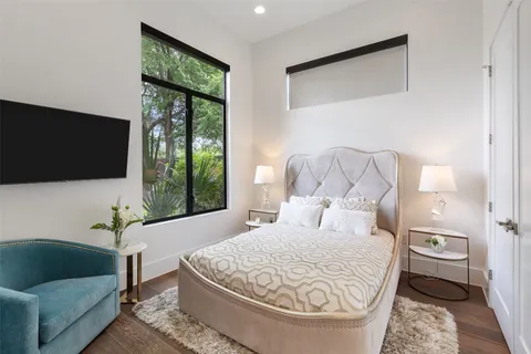 a living room with a couch and a flat screen tv