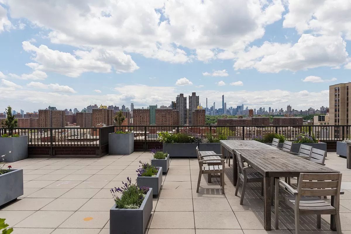1485 5th Avenue, Unit 18/19H Manhattan, NY 10035 - Photo 23 of 24 a view of a terrace with furniture
