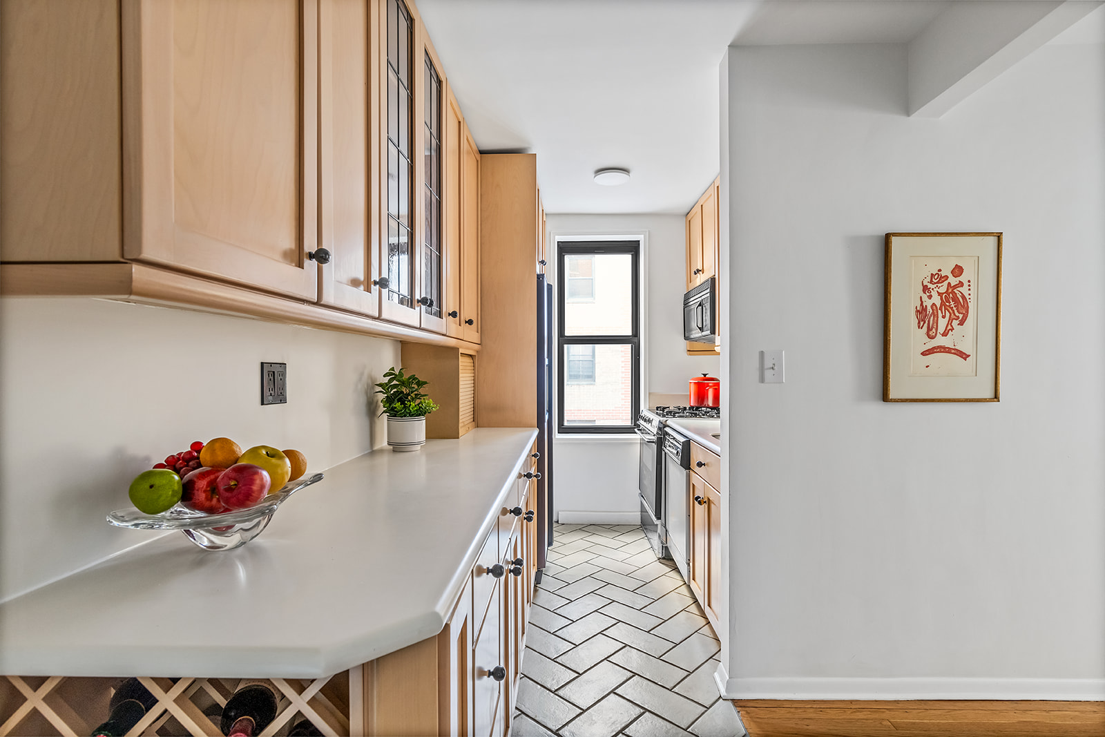 330 East 80th Street, Unit 5O Manhattan, NY 10075 - Photo 4 of 7 a living room with furniture and a window