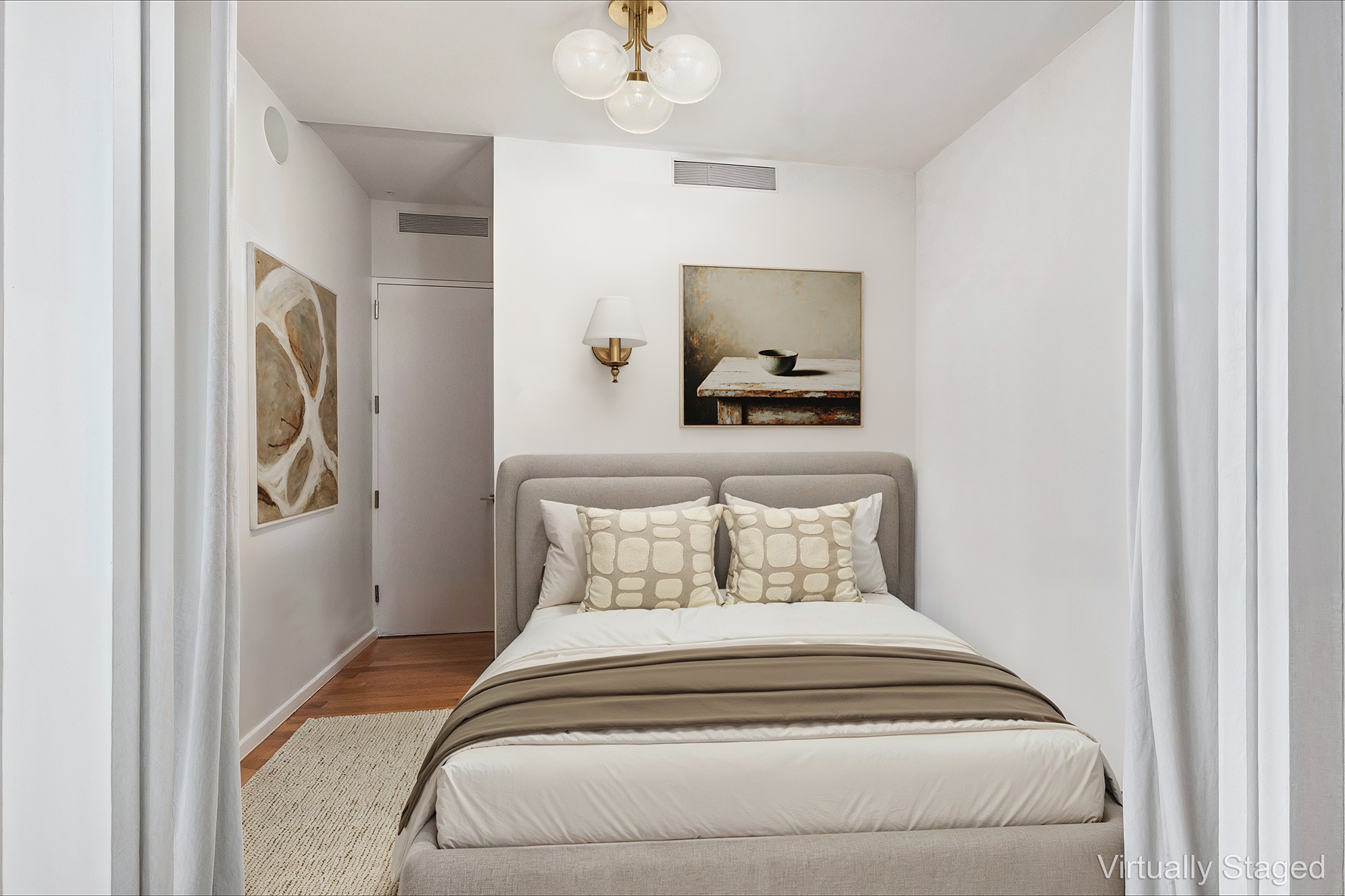 122 Greenwich Avenue, Unit 6 Manhattan, NY 10011 - Photo 7 of 13 a bedroom with a bed and a chandelier