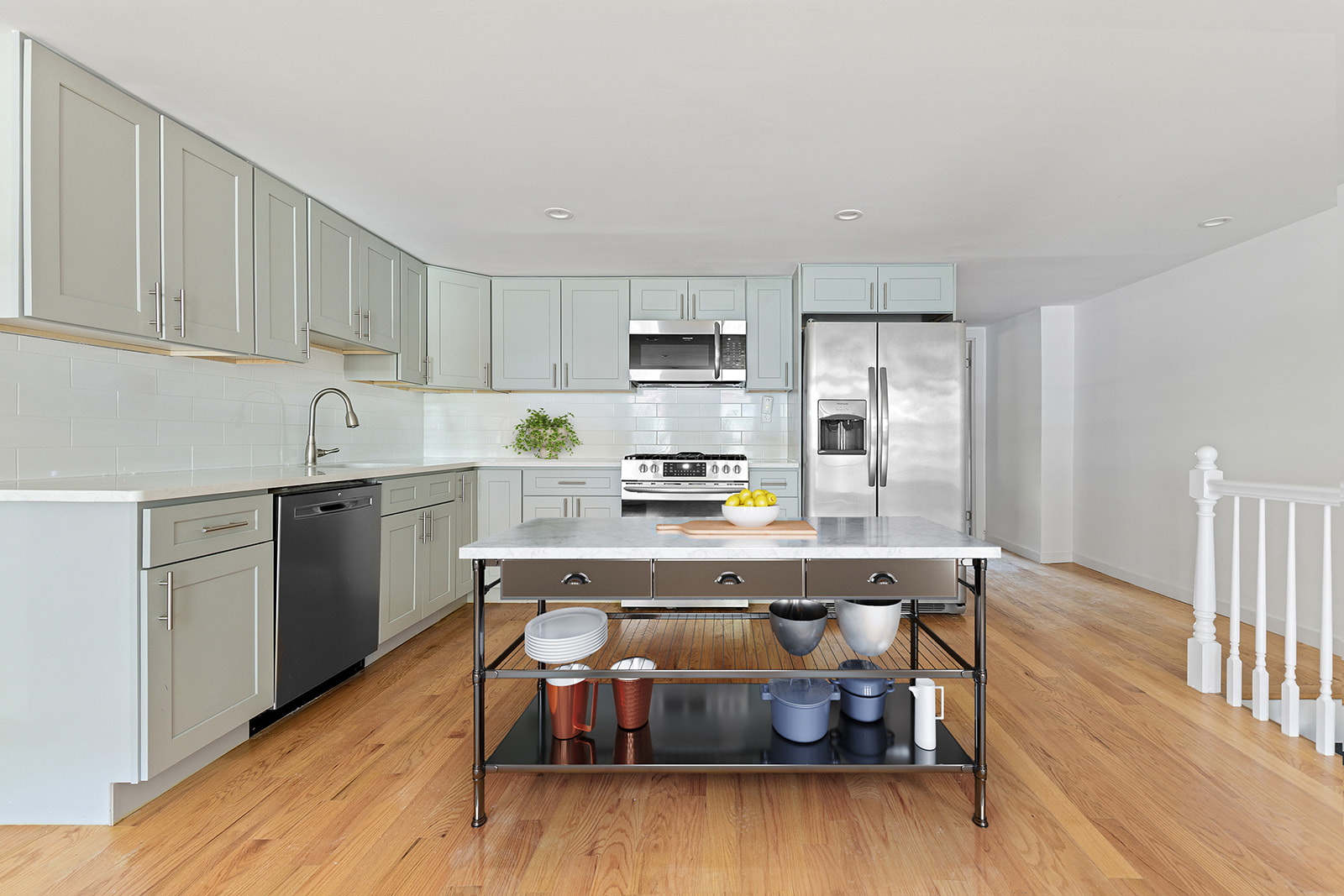 171 13th Street Brooklyn, NY 11215 - Photo 12 of 17 a kitchen with wooden floors and refrigerator