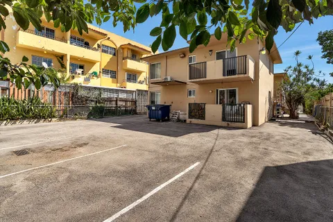 a view of a building with a street