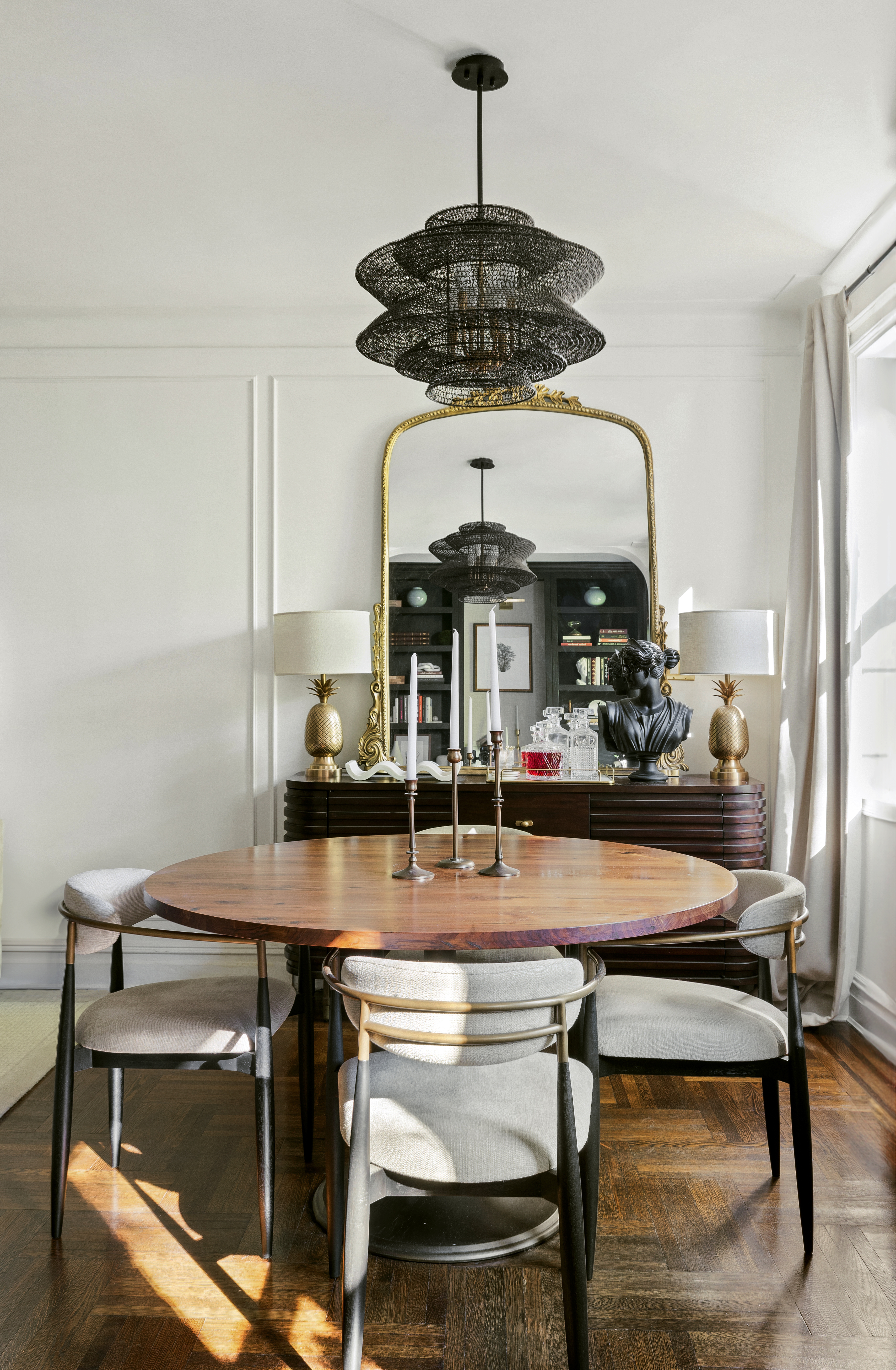 125 Ocean Avenue, Unit 2G Brooklyn, NY 11225 - Photo 4 of 16 a room with table chairs and a chandelier