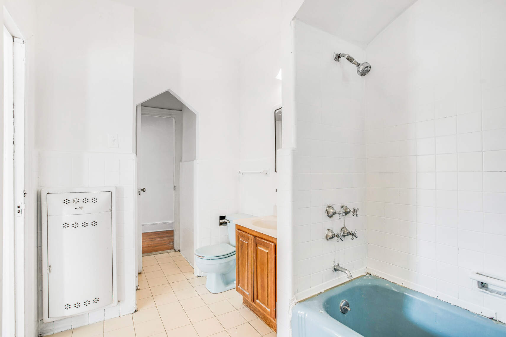 8301 4th Avenue Brooklyn, NY 11209 - Photo 6 of 20 view of bathroom with a tub shower and toilet
