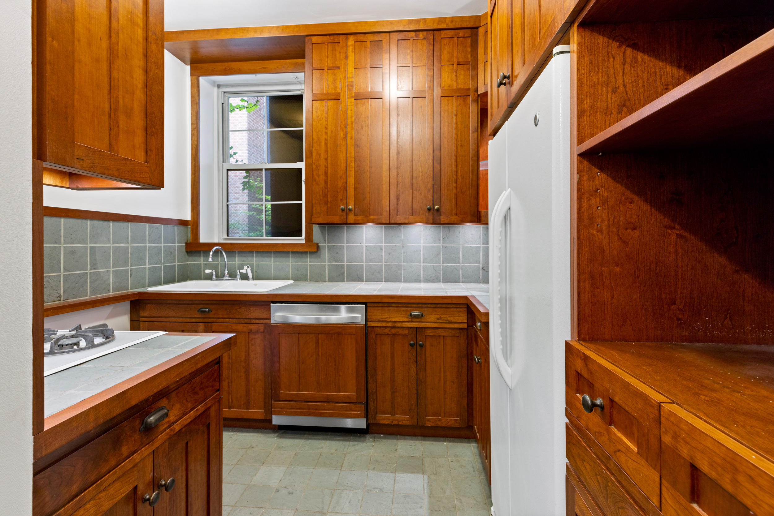 136 East 30th Street, Unit DUPLEX Manhattan, NY 10016 - Photo 4 of 26 a bathroom with a sink and a mirror