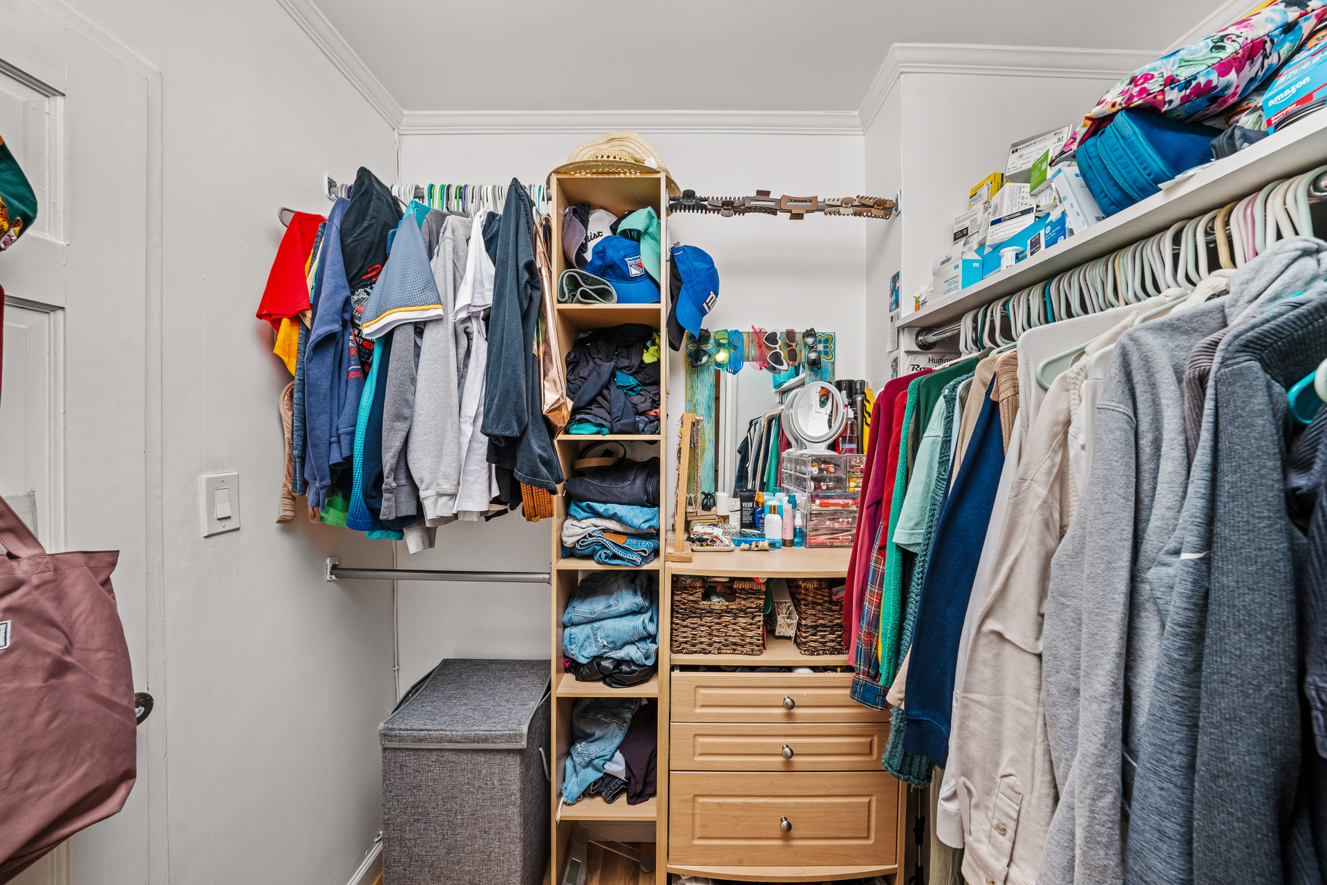 122 Ashland Place, Unit 14F Brooklyn, NY 11201 - Photo 6 of 16 a view of walk in closet with clothes and shoes