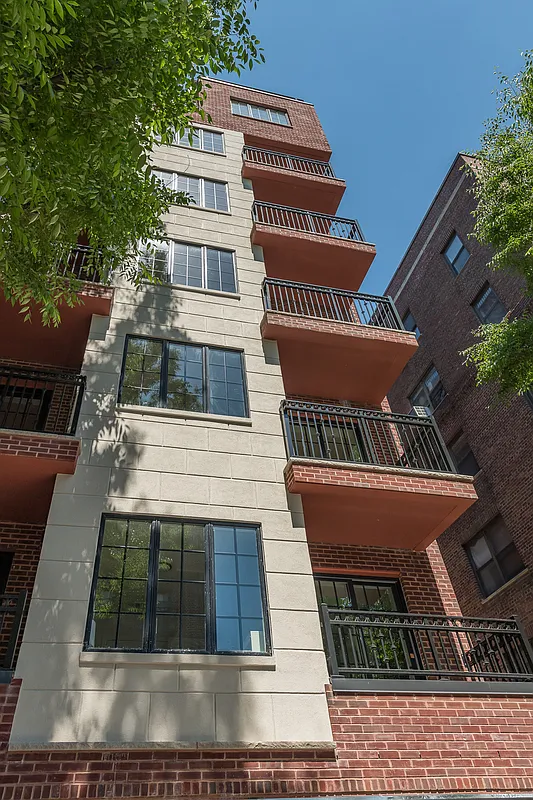 31-22 29th Street, Unit 4A Queens, NY 11106 - Photo 10 of 12 a view of a house with a yard