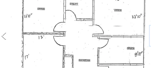 a picture of a bathroom with a shower