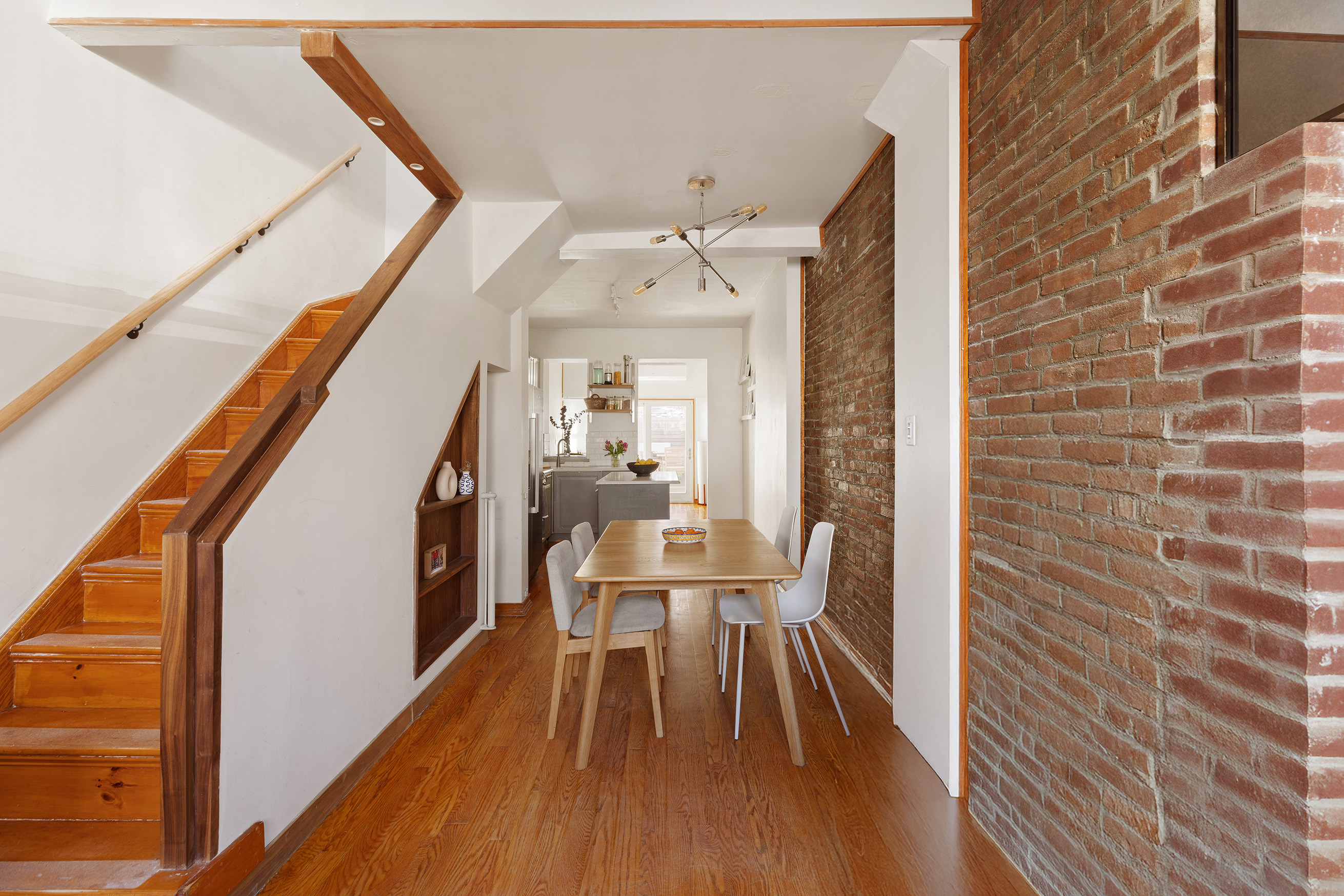 171 Monitor Street Brooklyn, NY 11222 - Photo 5 of 11 a view of a dining room with furniture and wooden floor