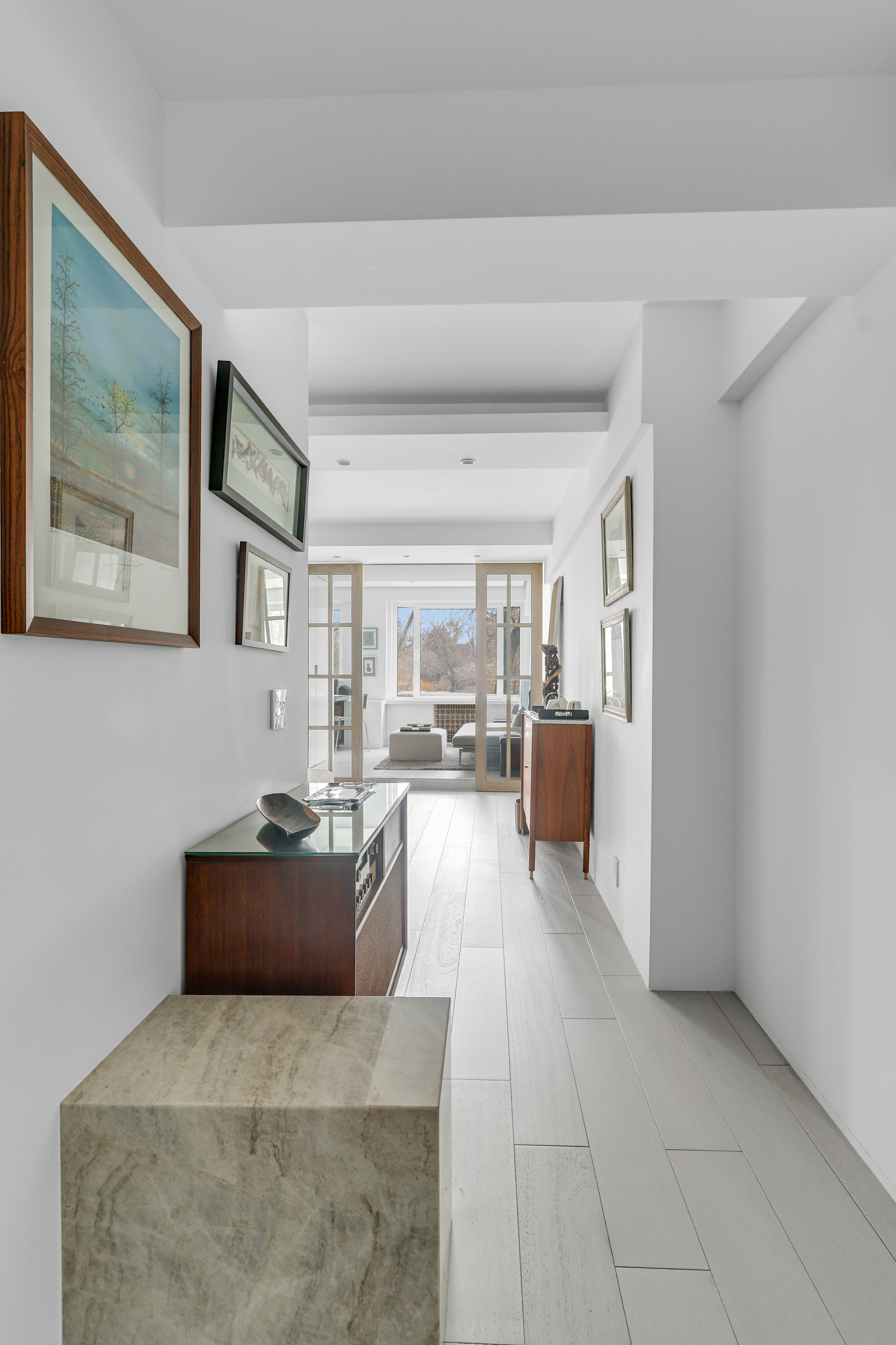 120 Central Park South, Unit 2 B C Manhattan, NY 10019 - Photo 7 of 13 a living room with furniture and a area