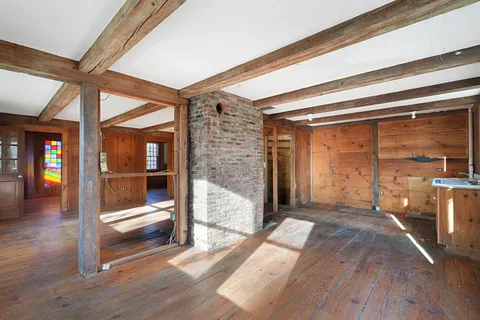 a view of gallery with front door