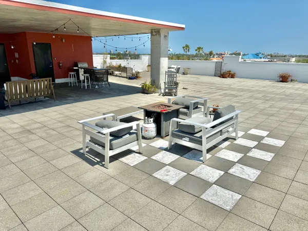 a outdoor space with lots of table and chairs