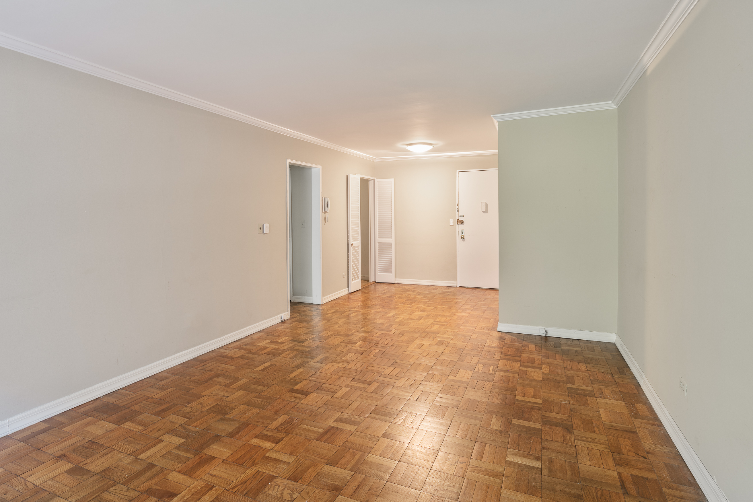 335 East 51st Street, Unit 2D Manhattan, NY 10022 - Photo 4 of 11 a view of an empty room