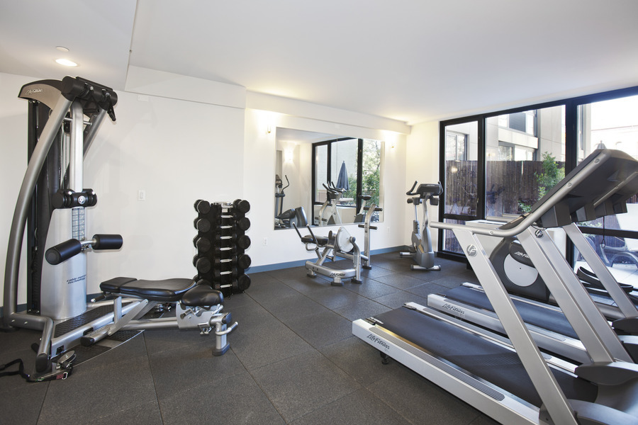 1595 Lexington Avenue, Unit 6E Manhattan, NY 10029 - Photo 9 of 13 a view of a room with gym equipment