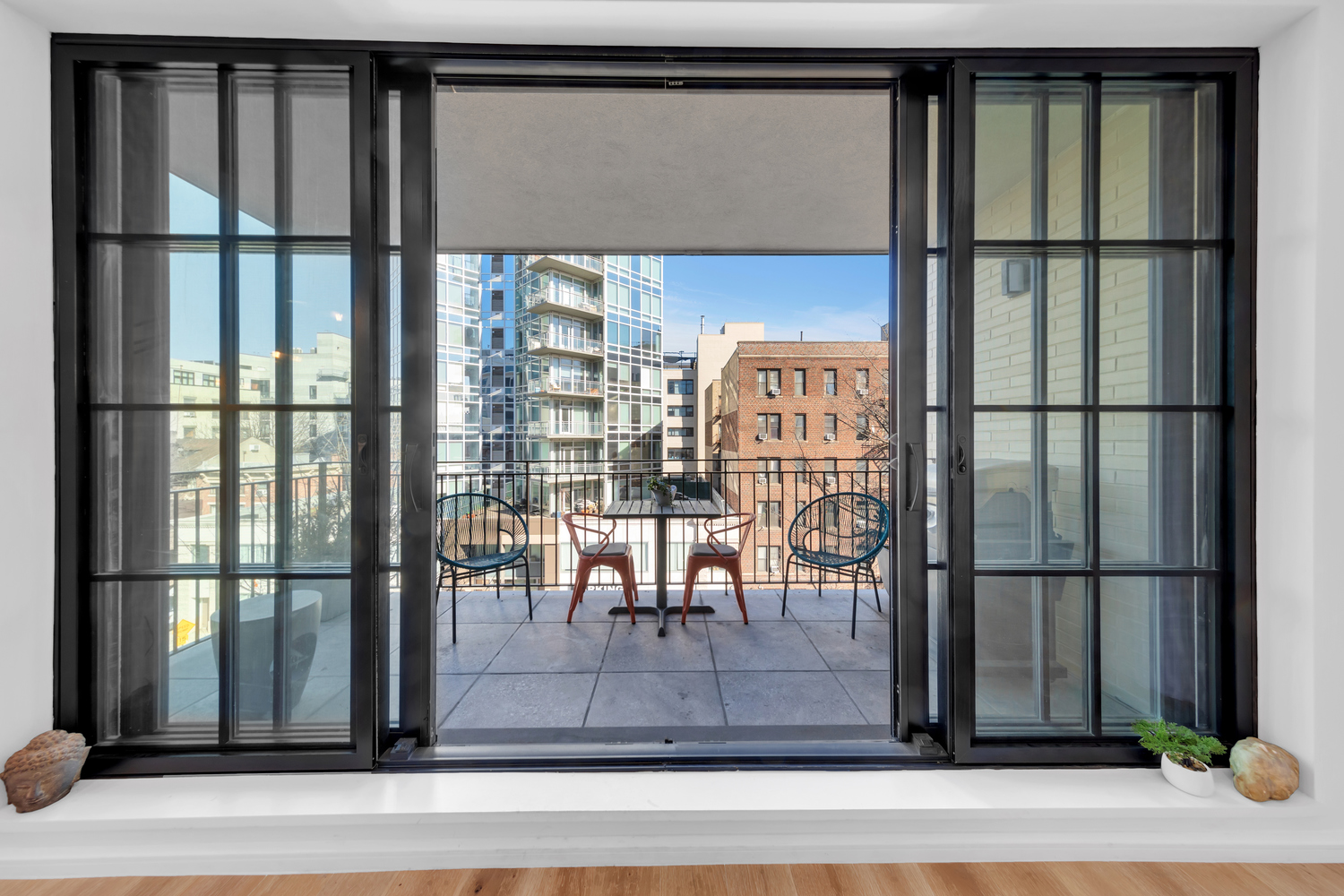 532 Clinton Avenue, Unit 5A Brooklyn, NY 11238 - Photo 3 of 11 a view of a porch with a floor to ceiling window
