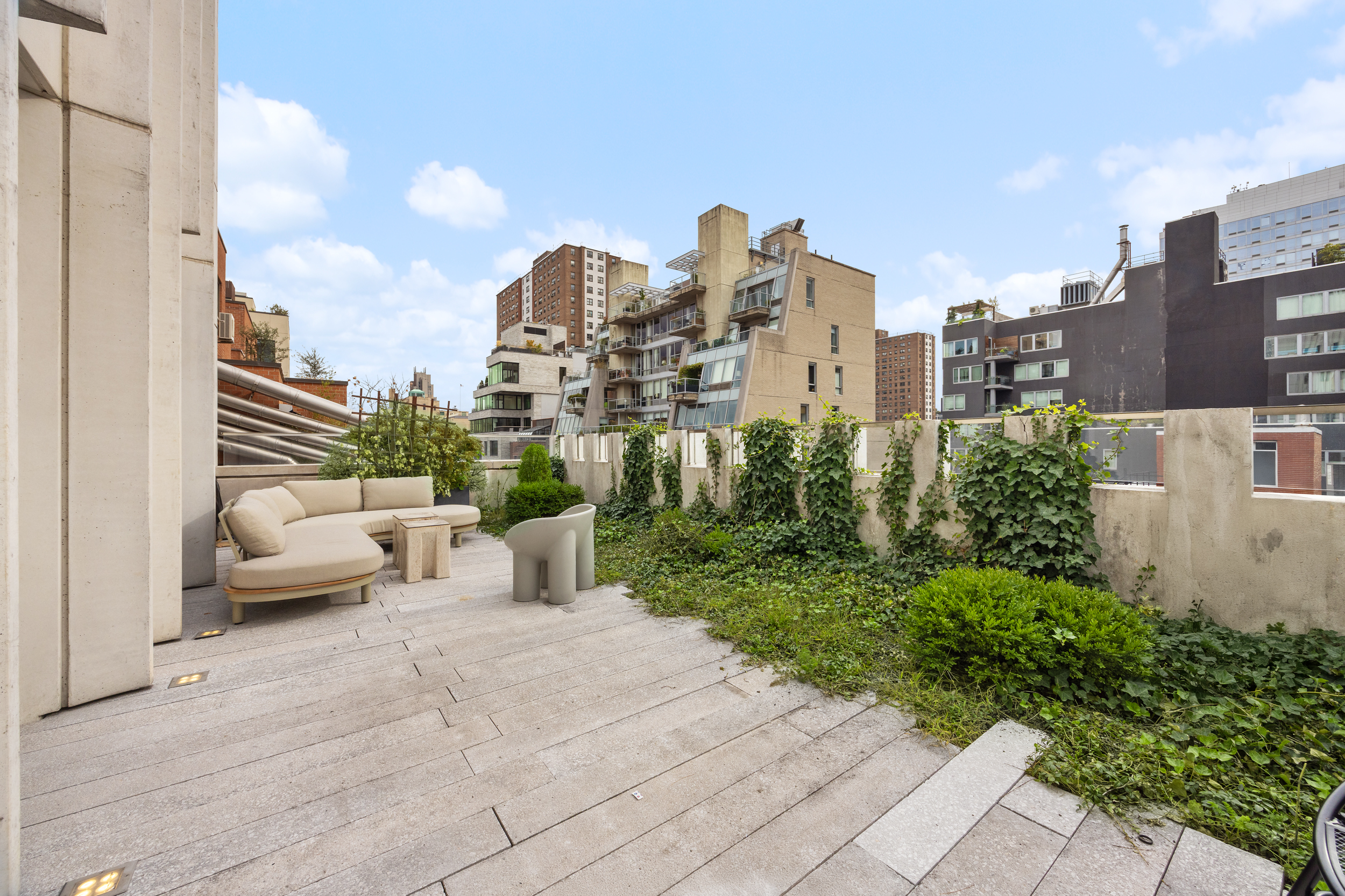 455 West 19th Street, Unit PH2 Manhattan, NY 10011 - Photo 5 of 26 a view of terrace with lawn chairs and iron fence