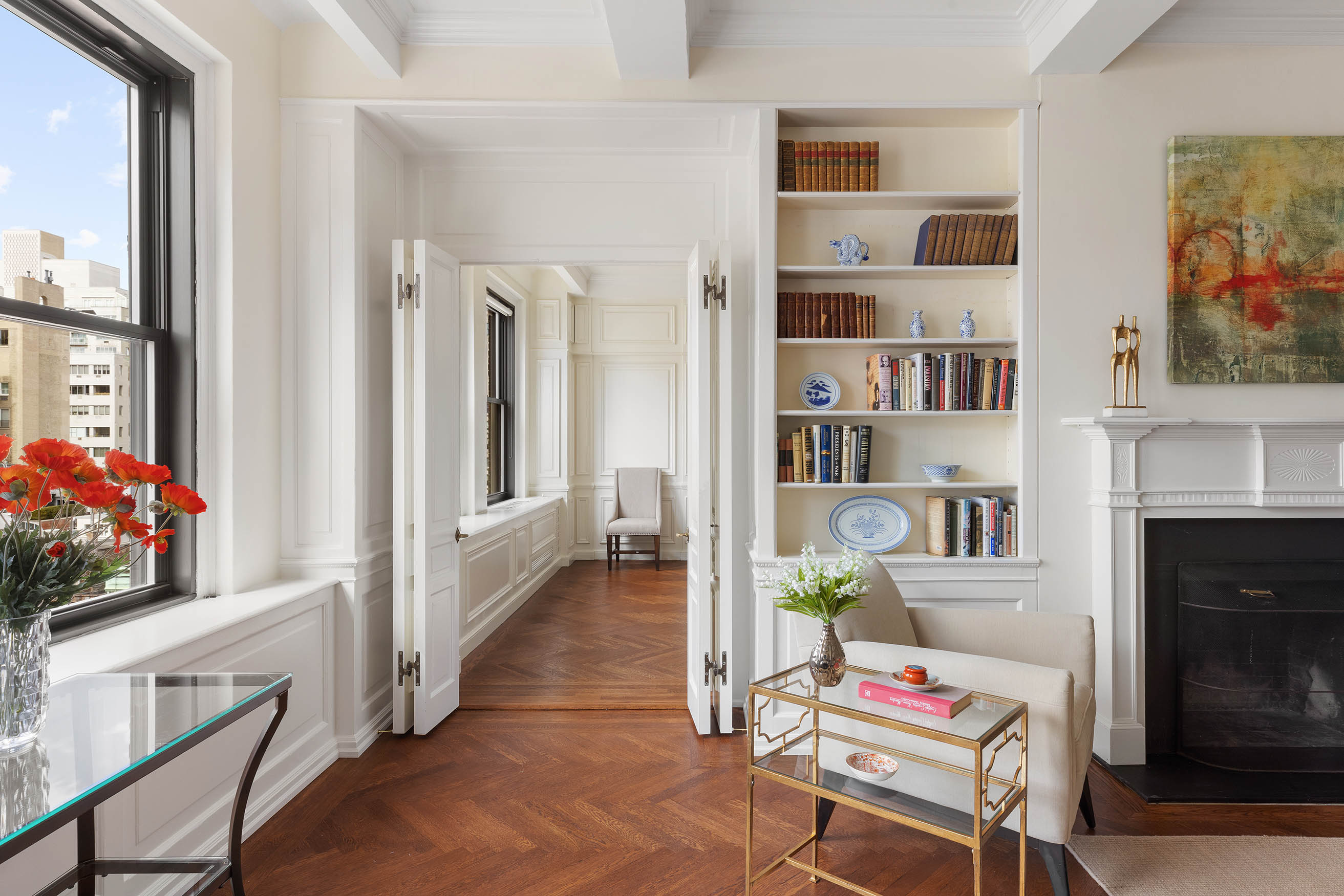 33 East 70th Street, Unit 9C Manhattan, NY 10021 - Photo 2 of 12 a living room with furniture and decor
