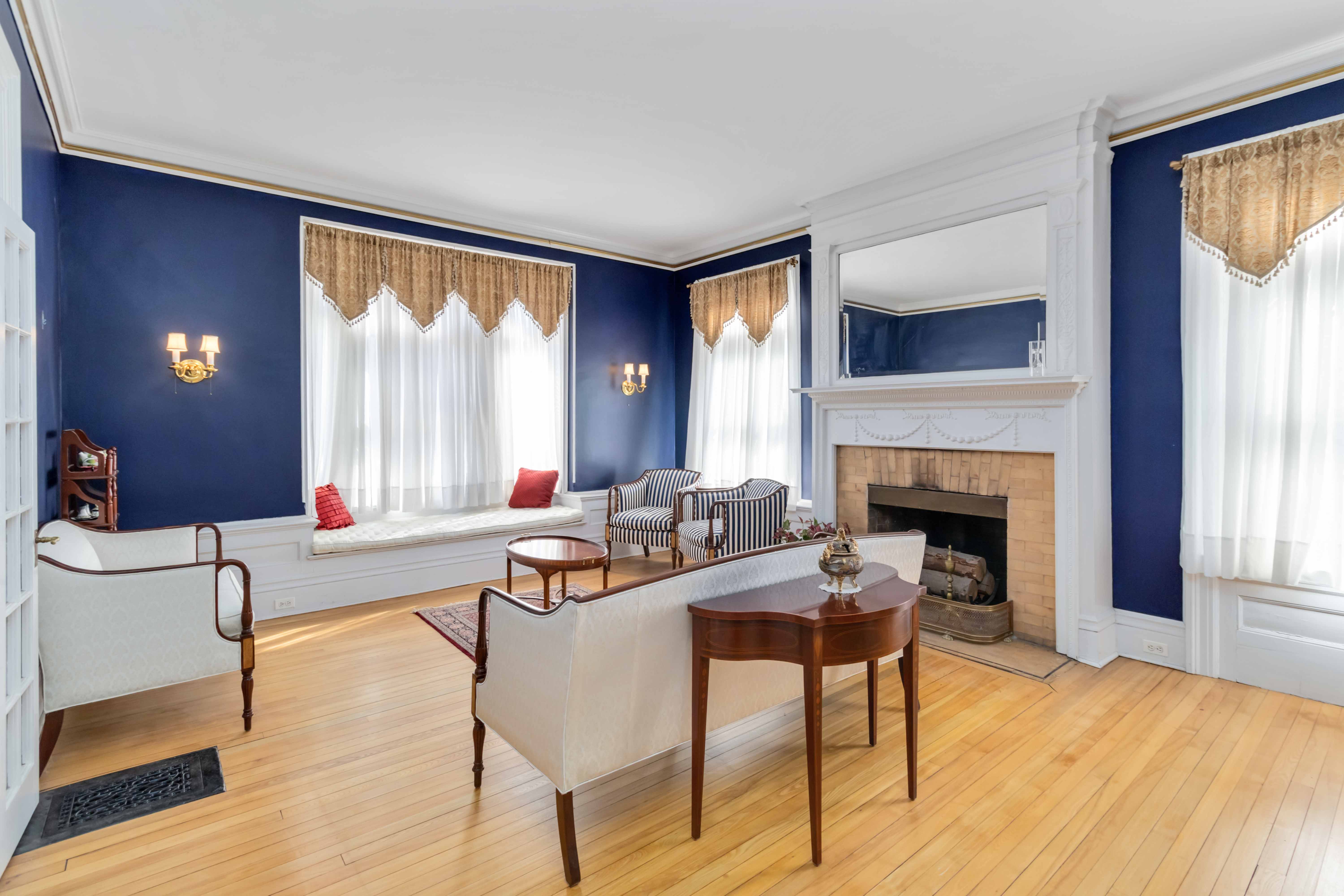 61 Miller Road Morristown, NJ 07960 - Photo 10 of 24 a living room with furniture and a fireplace