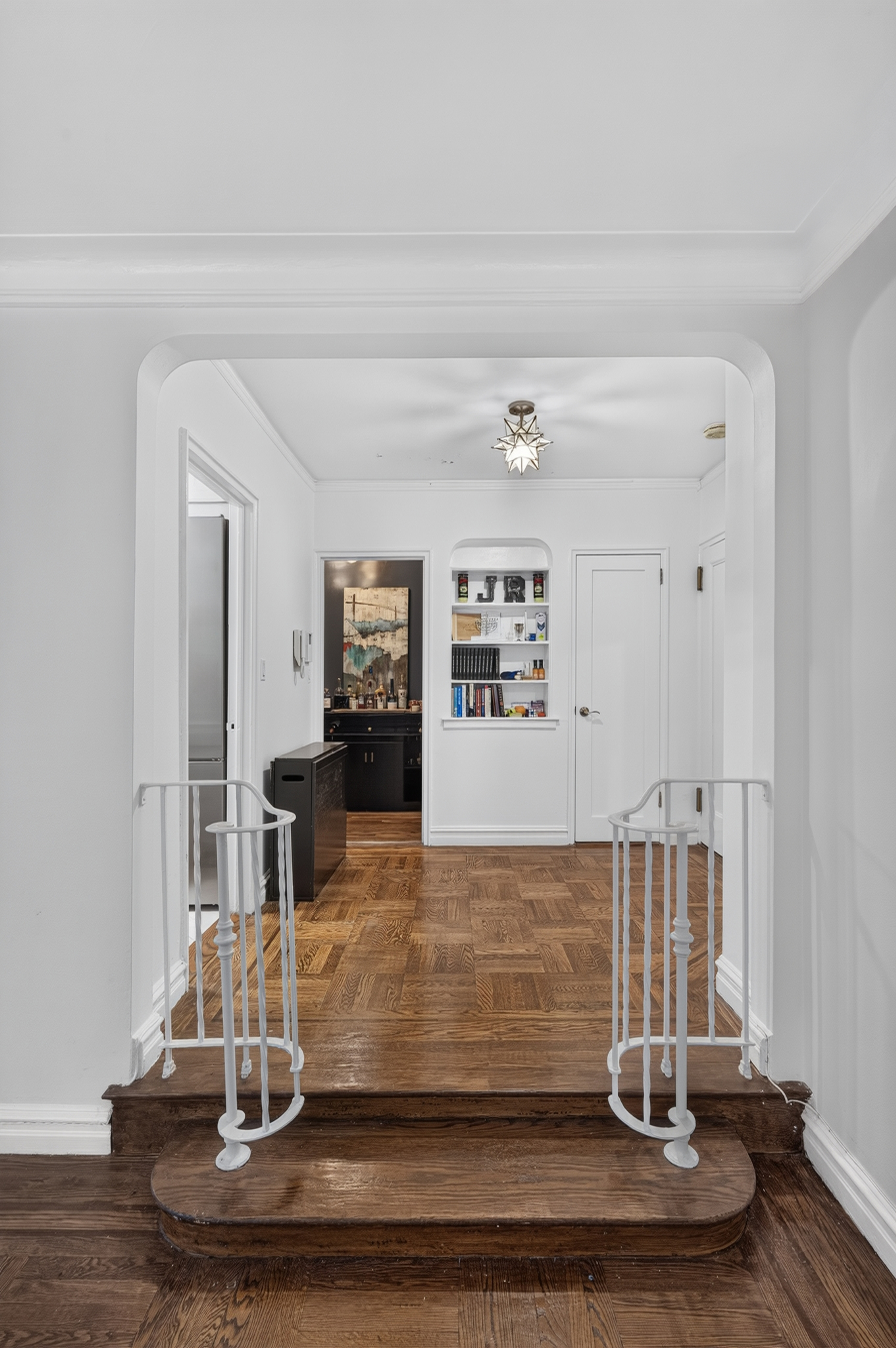 303 East 37th Street, Unit 5B Manhattan, NY 10016 - Photo 2 of 8 a view of a living room with wooden floor