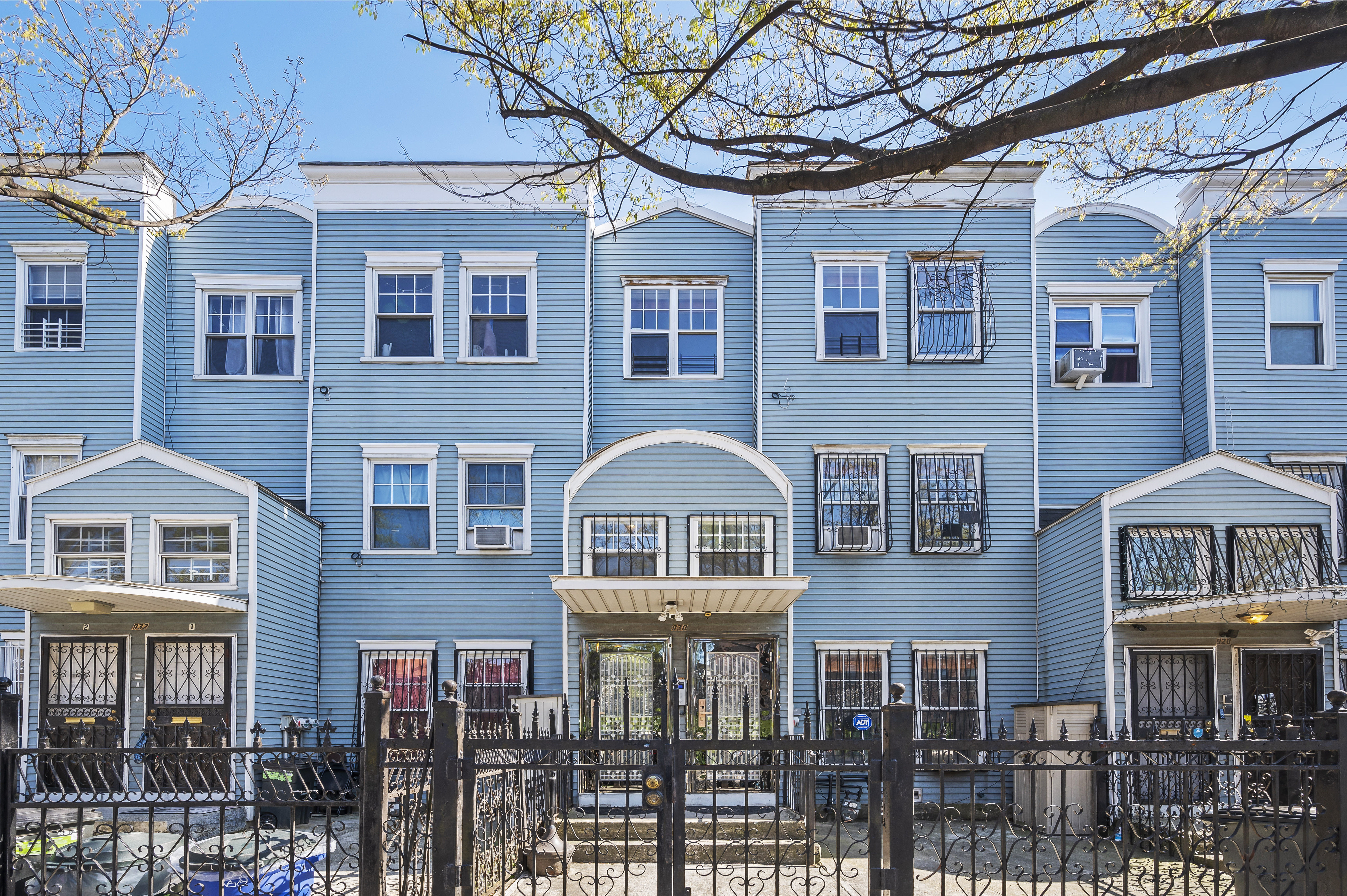 930 Jefferson Avenue, Unit 2 Brooklyn, NY 11221 - Photo 10 of 12 a front view of a residential apartment building with a yard