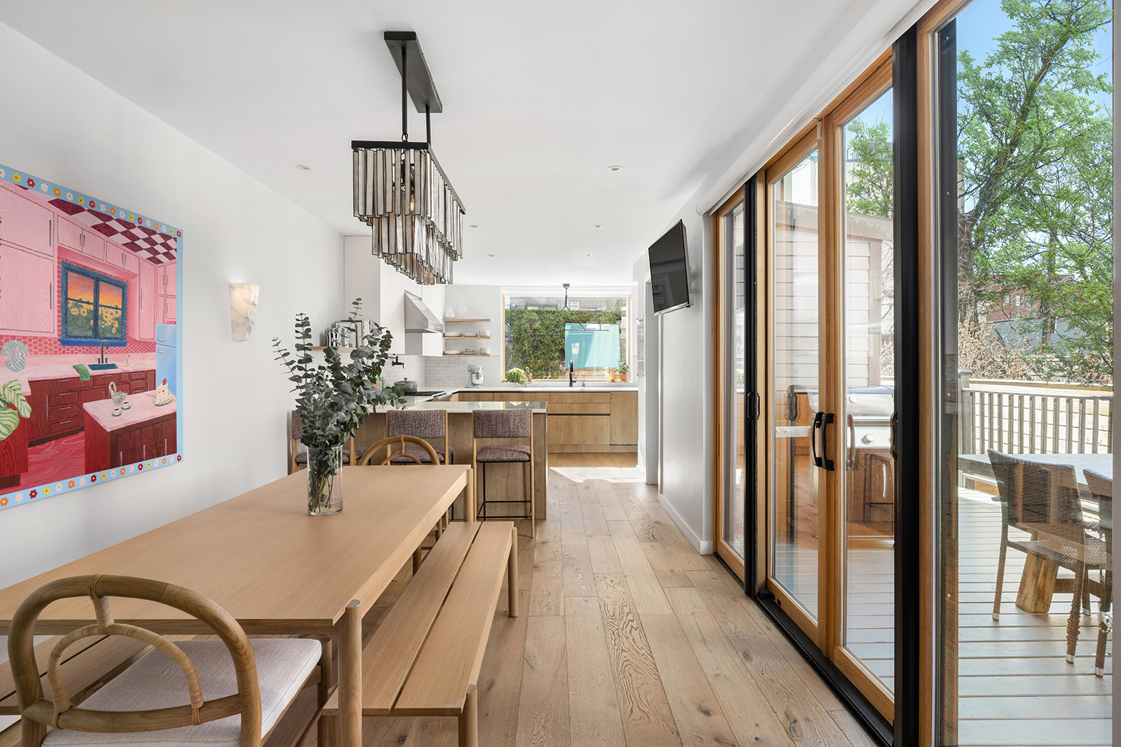 683 Leonard Street Brooklyn, NY 11222 - Photo 6 of 25 a dining room with furniture a chandelier and wooden floor