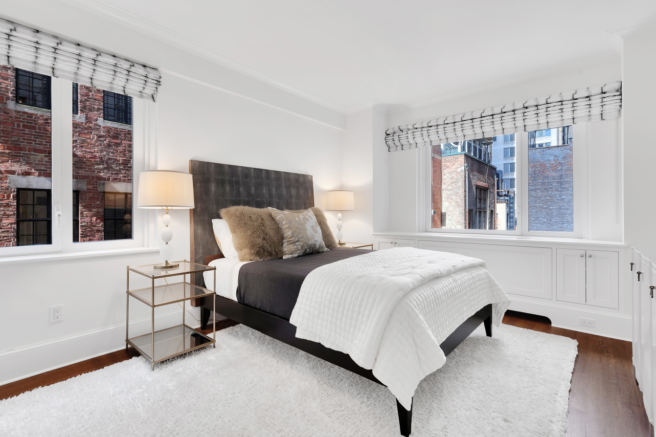 530 Park Avenue, Unit 4A Manhattan, NY 10065 - Photo 6 of 16 a bedroom with a bed and window