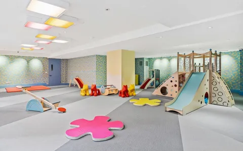 a bedroom with furniture and a wooden floor