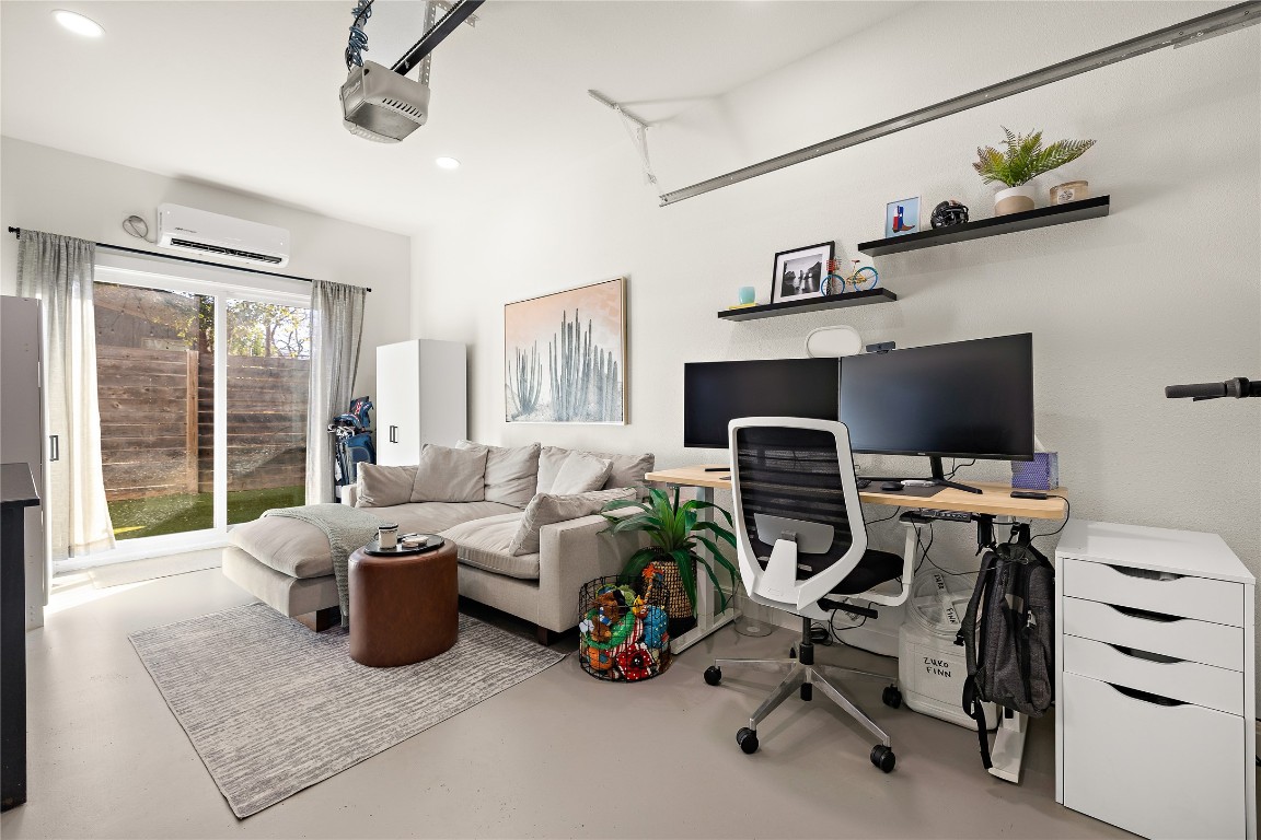 1402 Singleton Avenue, Unit B Austin, TX 78702 - Photo 14 of 26 a view of a workspace with furniture and a window