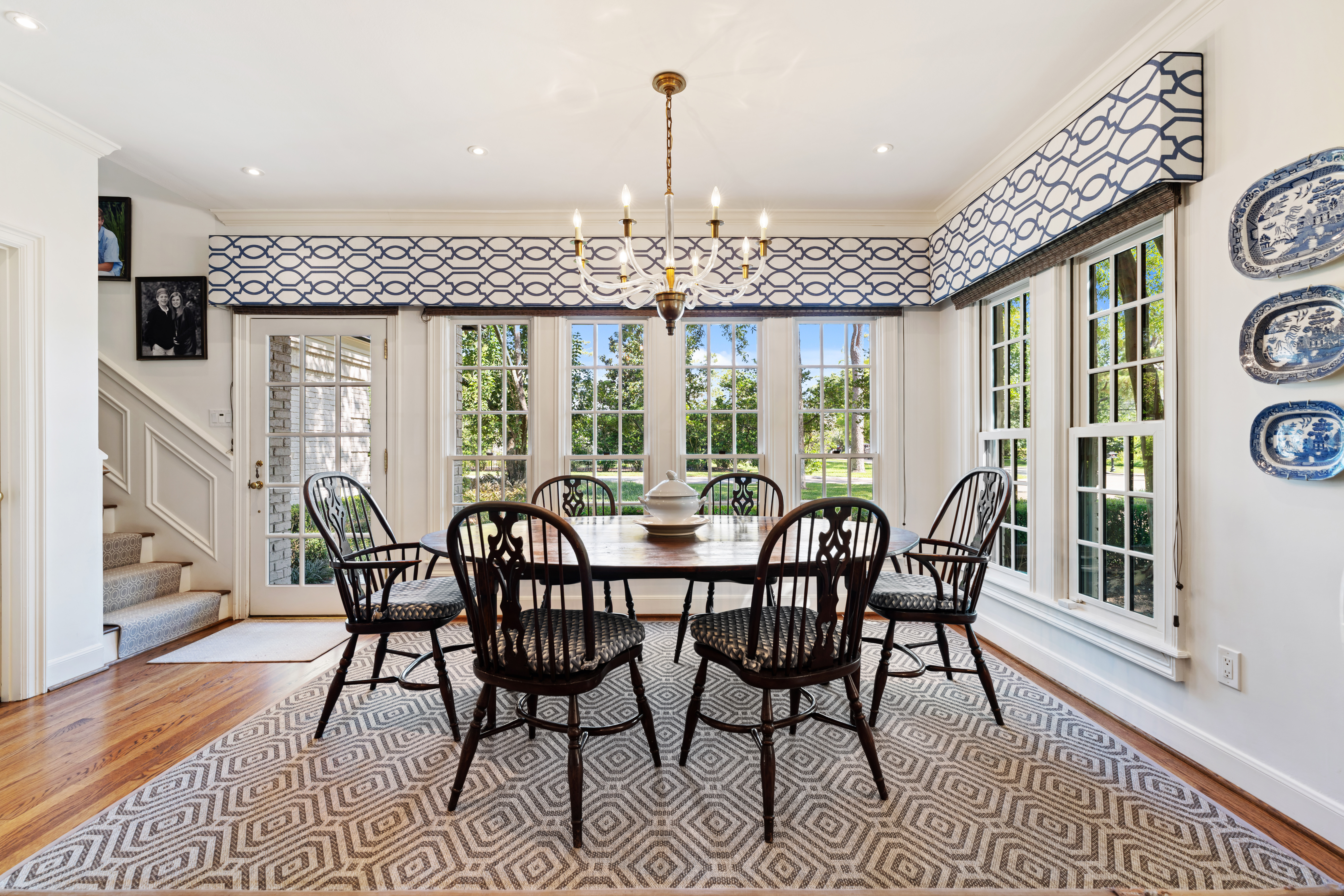 711 Pifer Road Houston, TX 77024 - Photo 21 of 53 a view of a dining room with furniture window and wooden floor
