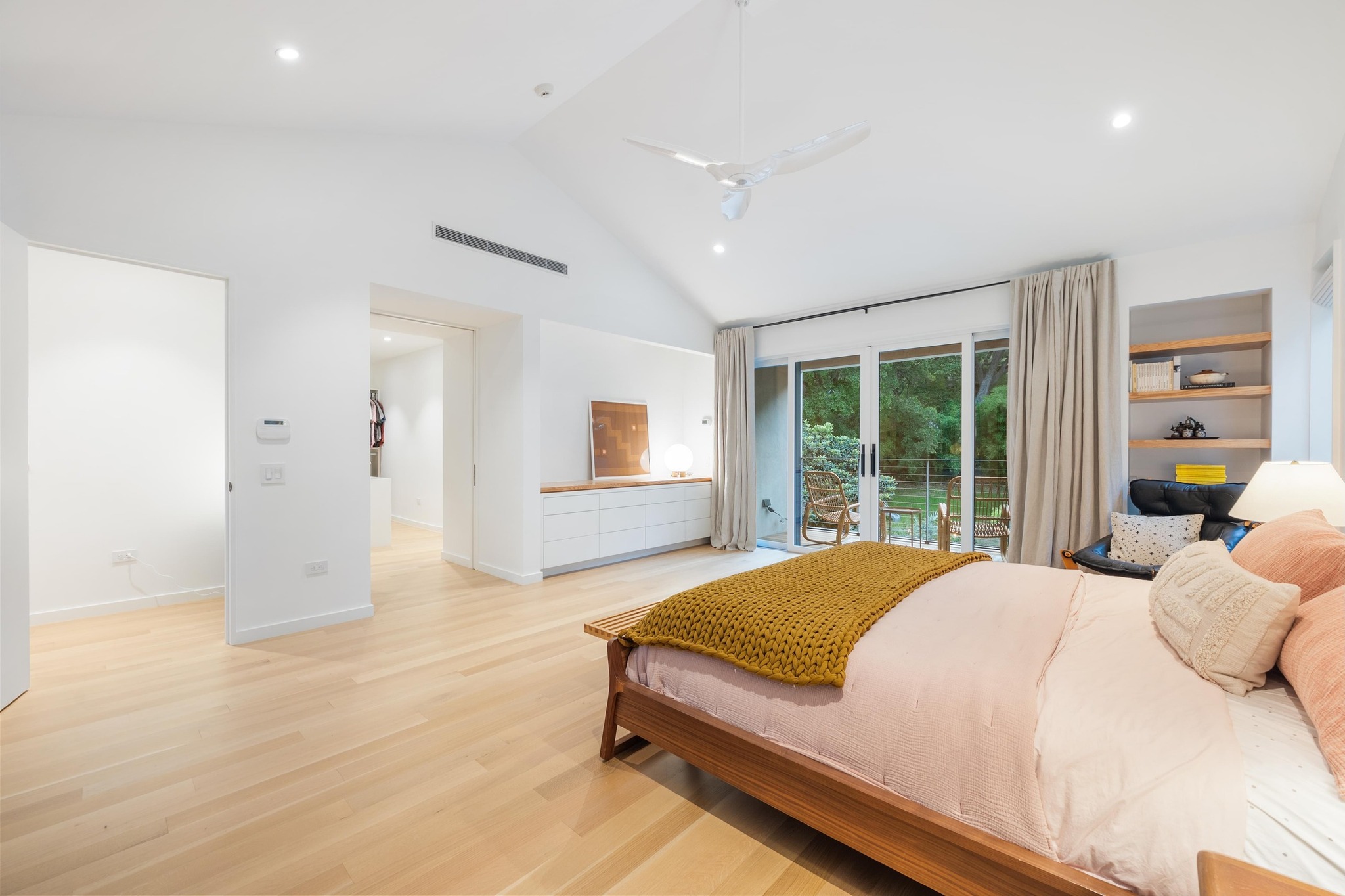 1206 Bickler Road Austin, TX 78704 - Photo 34 of 65 a bedroom with a large bed and a window