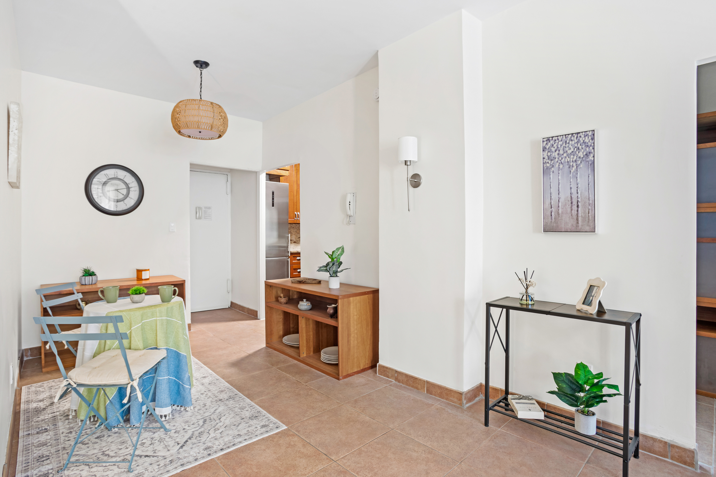 130 East 18th Street, Unit 1G Manhattan, NY 10003 - Photo 4 of 14 a view of storage and utility room with furniture and wooden floor