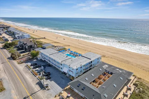 a picture of a bathroom with a sink and a mirror