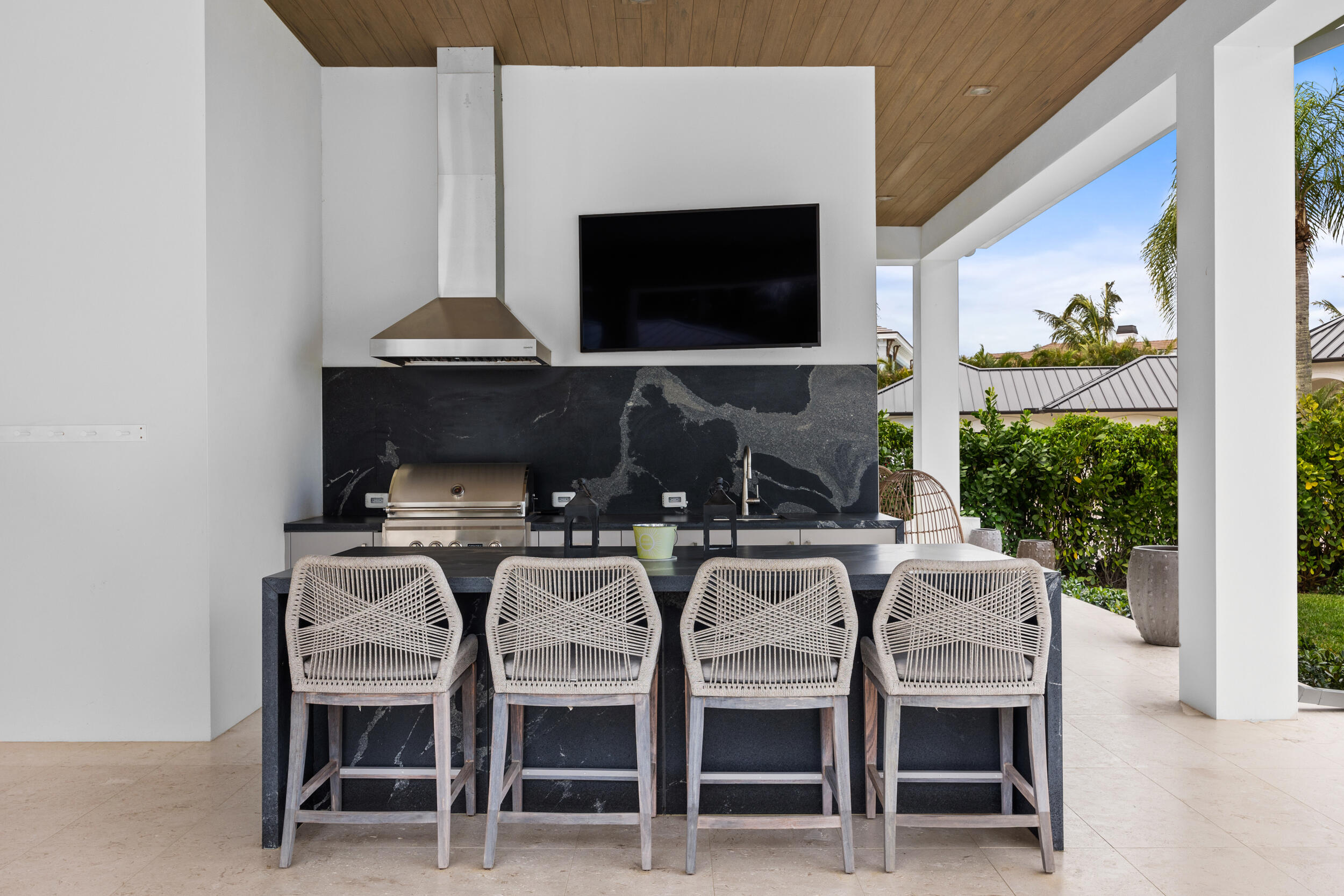 5695 Pennock Point Road Jupiter, FL 33458 - Photo 17 of 77 a view of a dining room with furniture and wooden floor