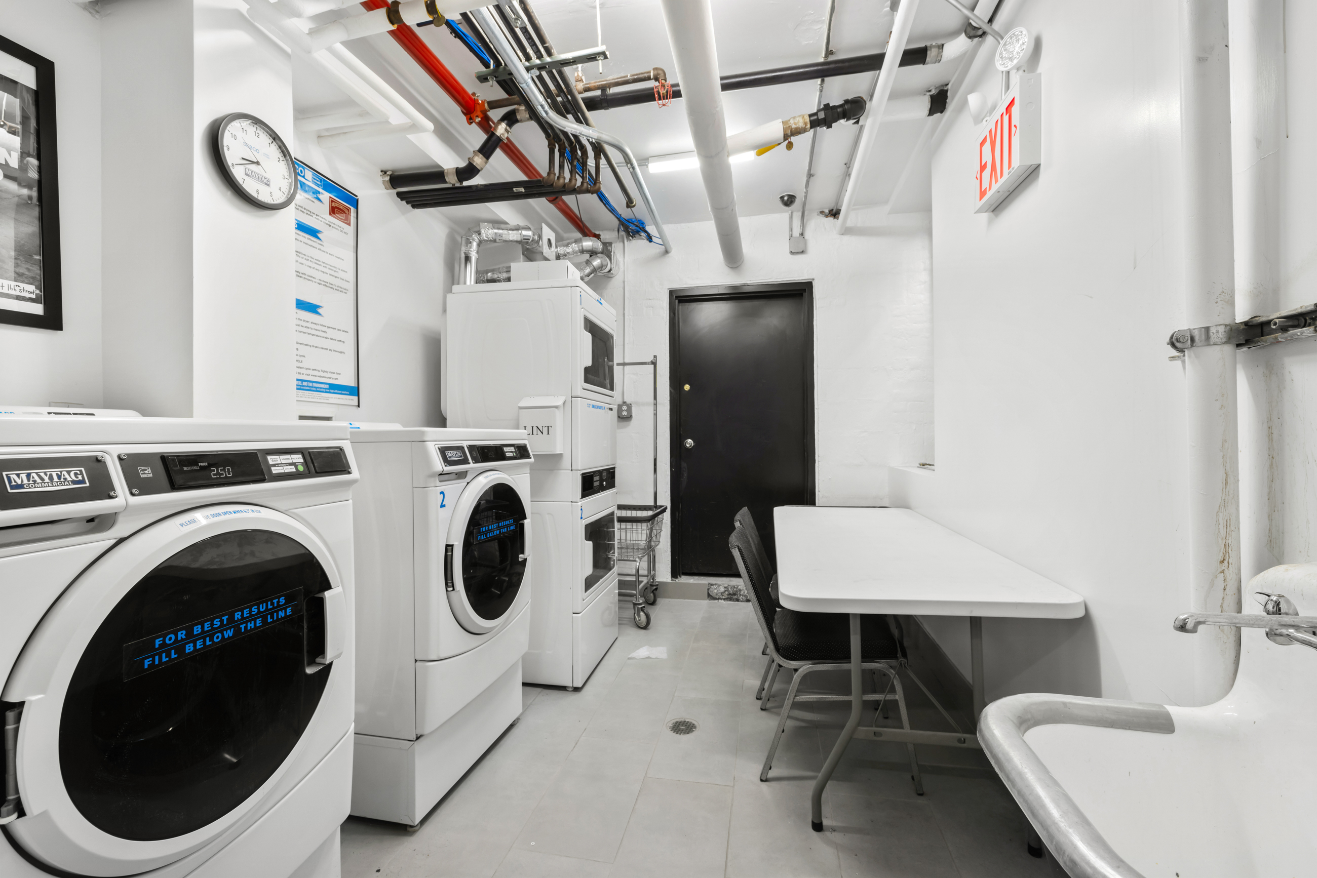 469 West 166th Street, Unit 2C Manhattan, NY 10032 - Photo 12 of 13 a view of entryway with washer and dryer