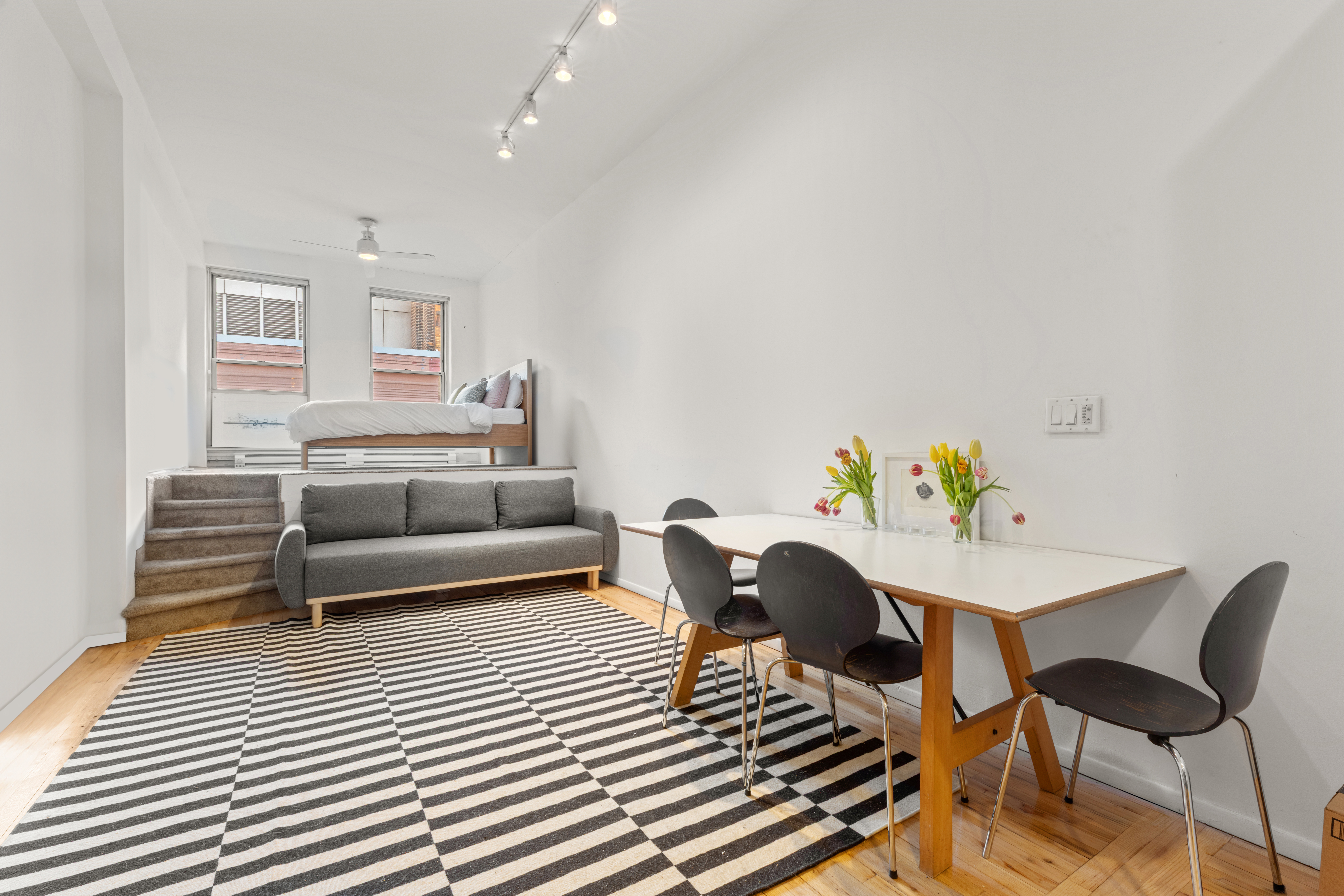 23 Waverly Place, Unit 6M Manhattan, NY 10003 - Photo 5 of 22 a living room with furniture and a table