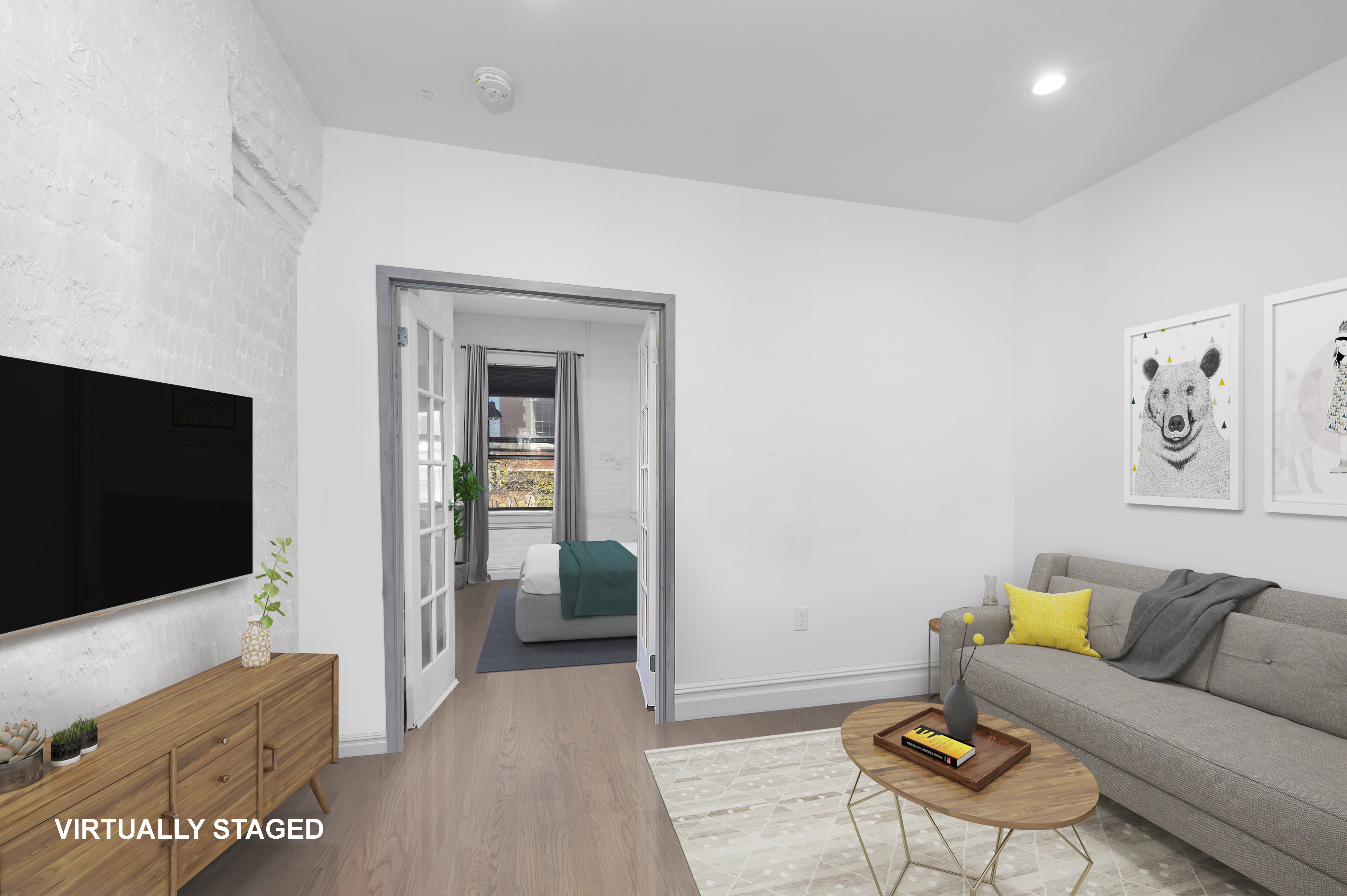 112 East 4th Street, Unit 4 Manhattan, NY 10003 - Photo 2 of 6 a living room with furniture and a flat screen tv