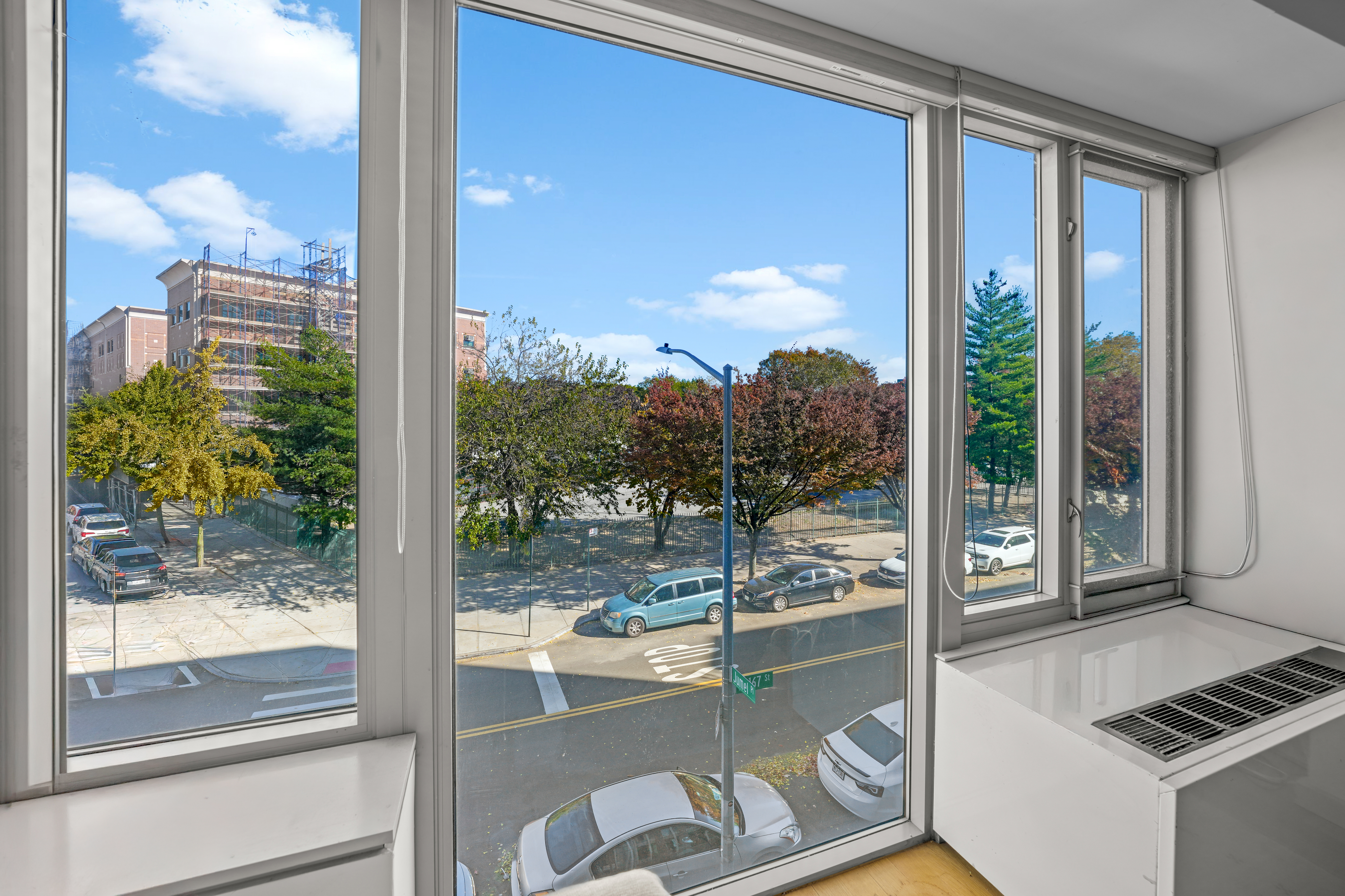 448 West 167th Street, Unit 3E Manhattan, NY 10032 - Photo 6 of 24 a room with a large window and pool table