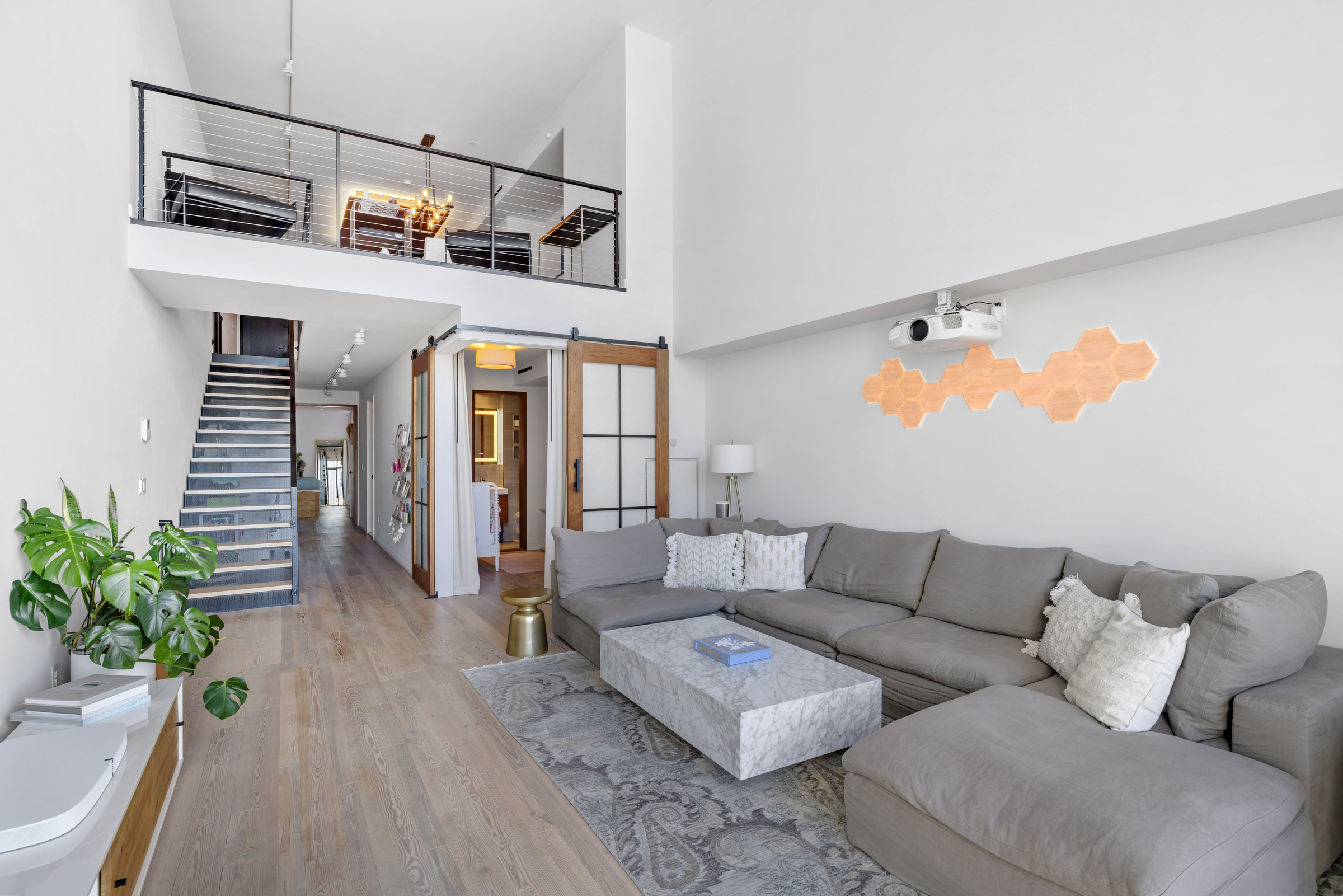 90 Furman Street, Unit N609 Brooklyn, NY 11201 - Photo 7 of 28 a living room with furniture and wooden floor