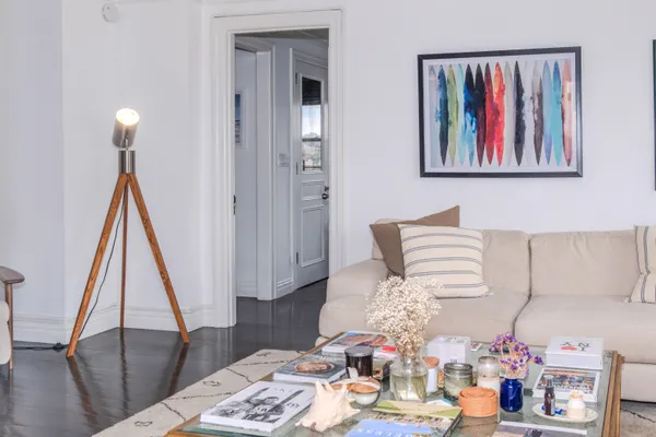 a bed room with furniture and wooden floor